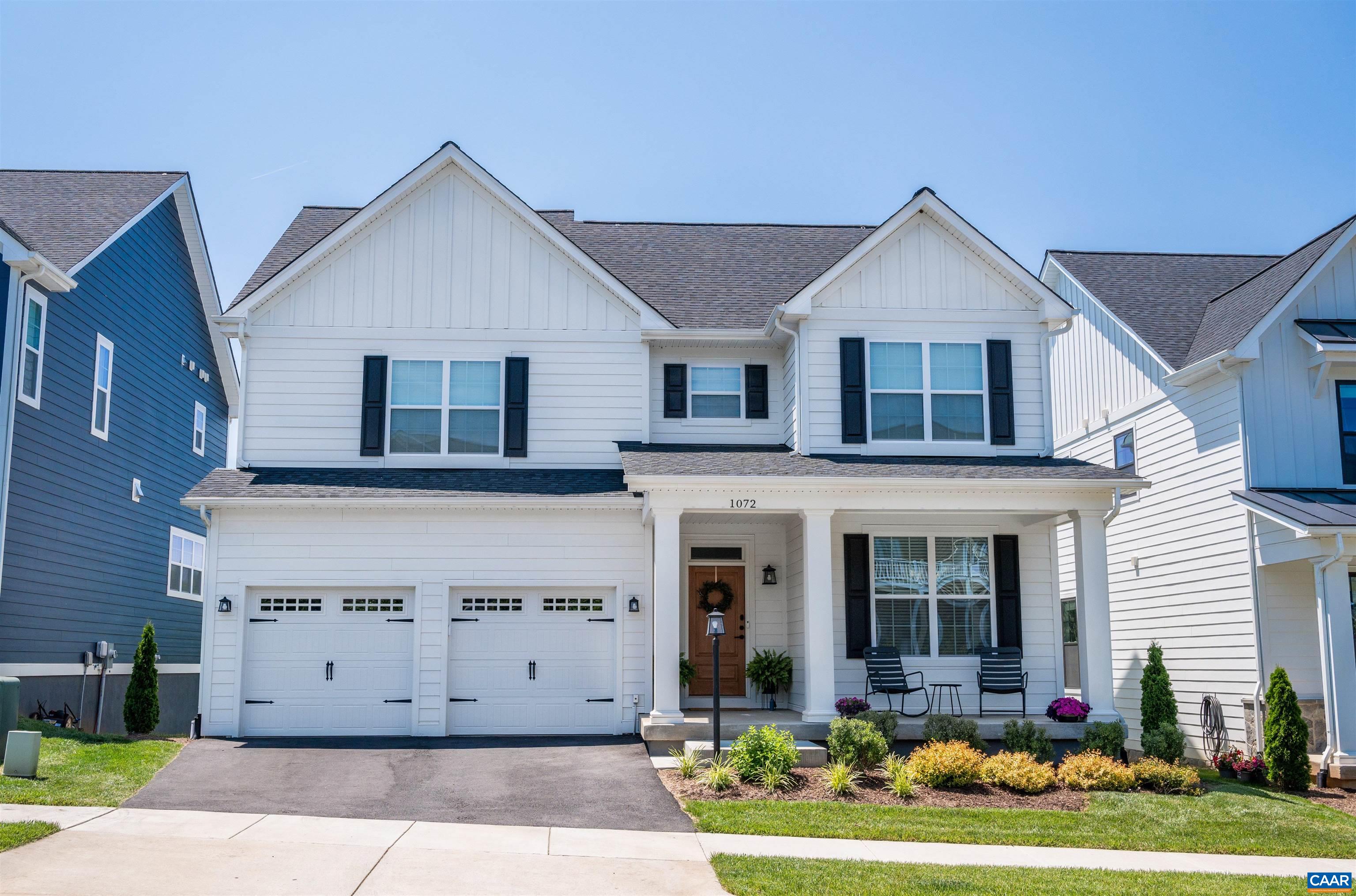 This PEARL CERTIFIED, HIGH-PERFORMING 4 bed 3.5 bath SOUTHERN DEVELOPMENT HOME features 2971 finished square feet, gorgeous HARDWOOD FLOORS, a FIRST FLOOR HOME OFFICE with french doors and sophisticated accent wall, convenient ATTACHED 2-CAR GARAGE, and light-filled GREAT ROOM with soaring VAULTED CEILINGS! Prepare meals in the WHITE EAT-IN KITCHEN with large ISLAND and neighboring Dining Room or grill out more casually and take in the WOODED VIEWS on the SUNNY BACK DECK! Sip your coffee from the ROCKING CHAIR FRONT PORCH or complete a workout in your 9' ceiling BASEMENT HOME GYM! Relax in the PRIVATE PRIMARY SUITE with WALK-IN CLOSET, spacious glass shower, and two sinks and have guests stay over in the PRIVATE BASEMENT GUEST SUITE! Enjoy the luxurious amenities that CASCADIA NEIGHBORHOOD has to offer (community POOL, garden, walking trails, playground, and more!) as well as being located just 3 minutes from Pantops shopping/entertainment/grocery stores and 5-10 minutes from Martha Jefferson Hospital, the historic Downtown Mall, and UVA!