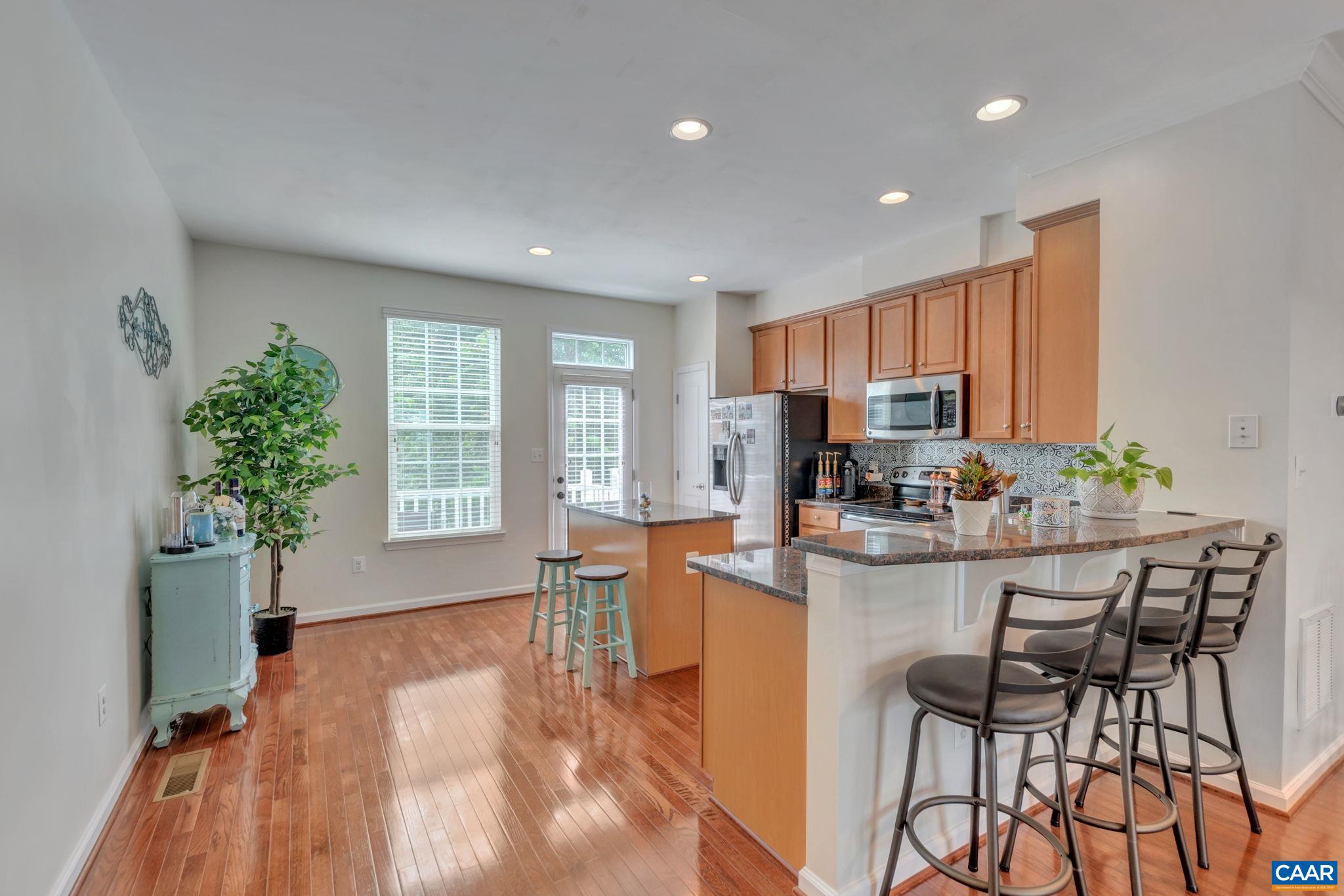 Welcome to this beautiful 3-story townhouse located on a quiet cul-de-sac in the desirable Briarwood neighborhood. With 3 bedrooms, 3 bathrooms, ample natural light, and a charming small back patio, this home offers a perfect blend of comfort and relaxation. The finished entry-level features a versatile third bedroom with an en-suite full bath, which can also serve as a private study or a guest retreat, a walk-out rec room that is currently used as a bedroom, and a full bath. On the third floor you will find the master bedroom with an en-suite bathroom, the second bedroom, third full bathroom, as well as the washer and dryer.  The Briarwood neighborhood offers convenience and access to NGIC, 29N, UVA, and Hollymead Town Center. 2 dedicated parking spaces, and multiple visitor parking.