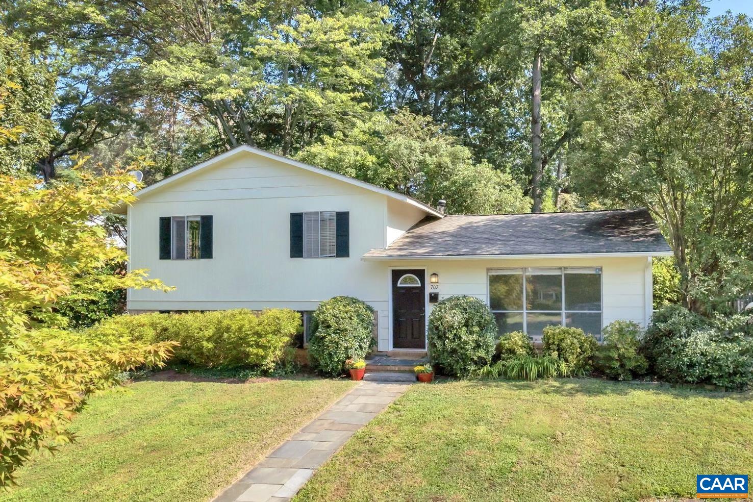Move in ready home in convenient Johnson Village neighborhood close to UVA and downtown CVille. The interior features fresh paint throughout main level and all of upstairs, solid flooring (no carpet), and stainless steel appliances. This home lives large with three bedrooms and two full baths, vaulted family room, and a huge rec room with wood burning fireplace in basement. Enjoy the outdoors in the private, fenced backyard with mature landscaping.