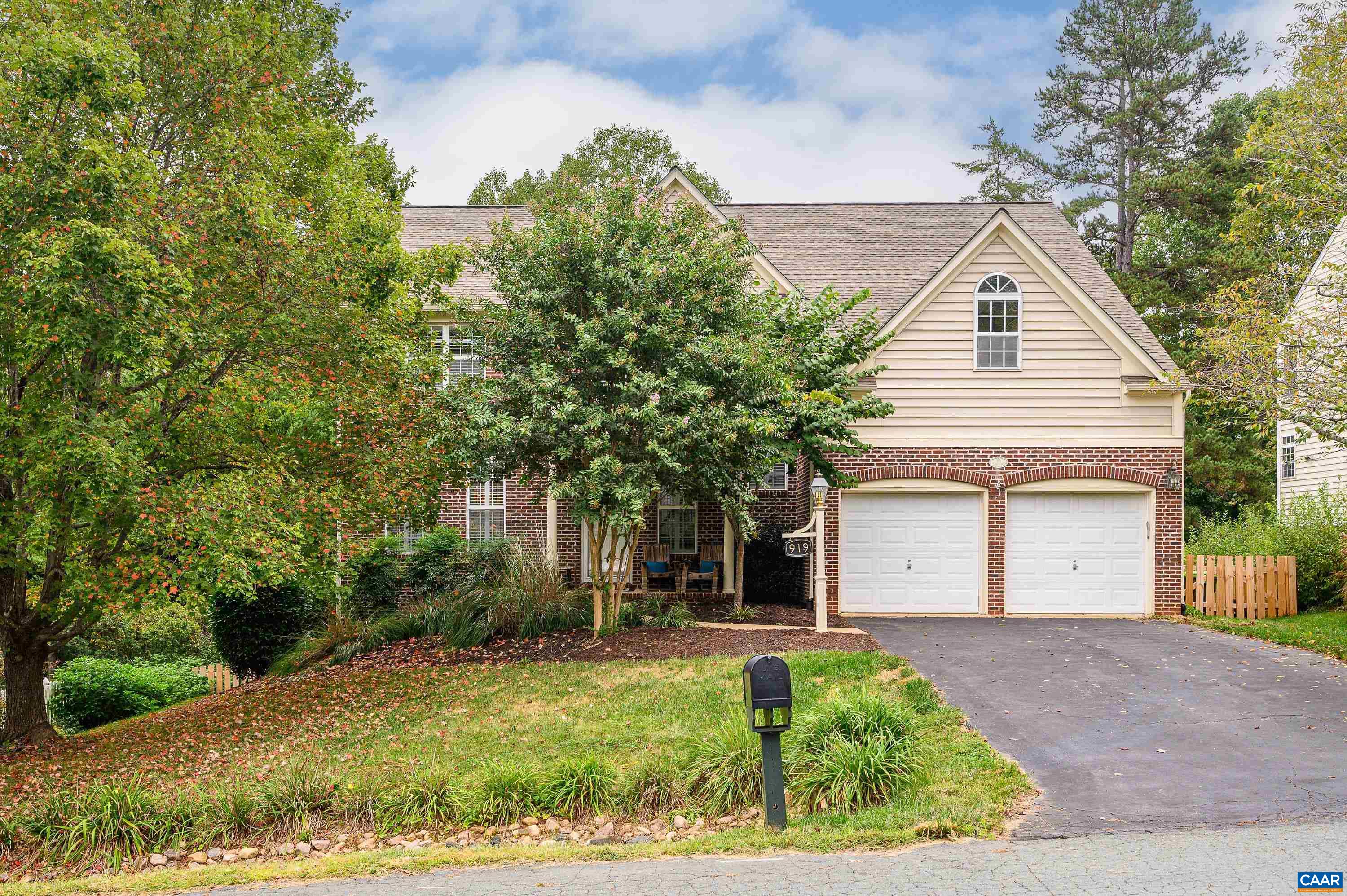 Cul-de-sac living in Cory Farms! Driving down Summit View Lane, the western mountain views are stunning! Pull into the drive of this lovingly maintained and recently updated home with direct access to the Common Natural Area and Lickinghole Creek. A connected system of walking trails allows for easy access to other area neighborhoods. Inside find tall ceilings, ample natural light, wood floors throughout the first floor. A flexible, open floor plan allows for easy entertaining. The recently renovated kitchen boasts white cabinets, granite countertops, tile backsplash, and stainless steel appliances. Enjoy the newly re-surfaced back deck with views to a mostly-level, fully-fenced backyard and views to the natural area beyond. Upstairs you'll find 4 bedrooms including the primary, and an add'l hall bathroom. The primary bedroom and a secondary bedroom have wood flooring. The spa-like primary bathroom includes a glass-enclosed shower, freestanding tub, and double vanity. In the basement there's a spacious den, a 5th bedroom and 3rd full bathroom, and an exercise and/or storage room. Access the backyard and a new Trex patio for extended outdoor entertainment space. Minutes from county schools, shopping, vineyards and more!