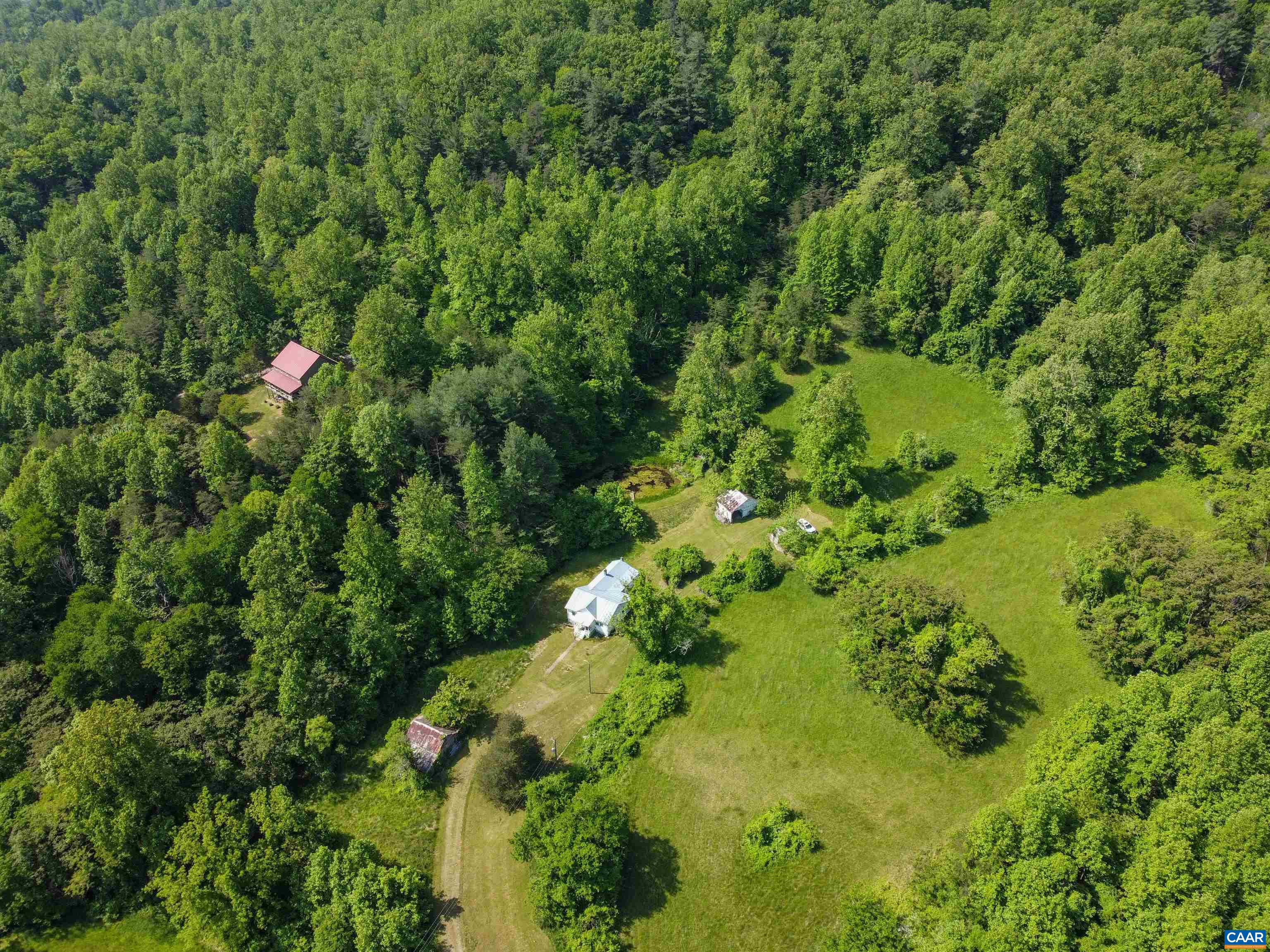 Land, land and more land!!  At approximately 275 acres and priced 400K below 2023 assessments, these combined and contiguous 7 parcels make this is a very rare find.  Property is located in Albemarle and Greene Counties.  A mixture of forest, pasture, and mountains, with a small house to be sold "as-is", a small pond and also includes an old Church that sits on the nearly 1,000 feet of frontage on the Lynch River.  There is also a small cemetery on the border of the property.  Great potential for recreation, hunting, timber, vineyard, investment opportunity, or just pick out one of the many homesites and build your dream home!
