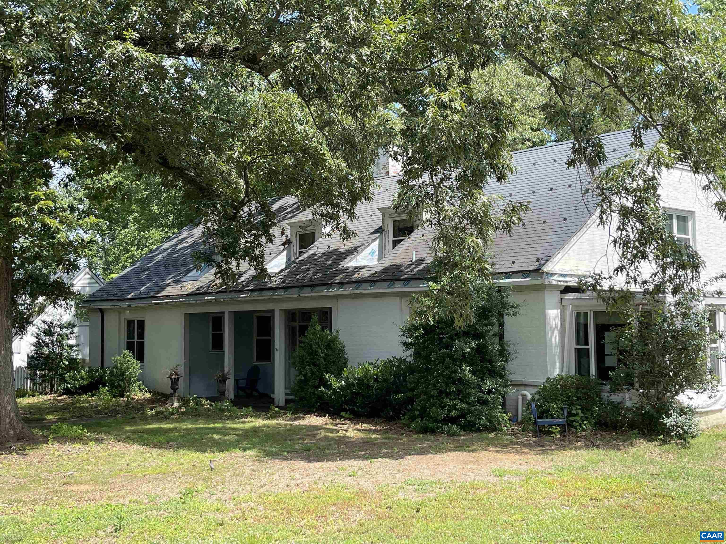 RARE OFFERING in one of Charlottesville's most popular and coveted neighborhoods, Meadowbrook Hills.  Circa 1959 brick home with slate roof,  designed by noted architect, Henderson Heyward, who was known for designing elegant, traditional homes with generous room sizes and large windows, and great multi-purpose spaces. The kitchen was recently remodeled by renowned kitchen designer, Karen Turner. This home has great space now, with at least four bedrooms, and both formal and informal rooms, but it has great potential to be a superb 4-5 bedroom home, including a large main level master suite, three en suite bedrooms on the second level, and a terrace level guest or in-law quarters, or extra space for the nuclear family. The home is on a quiet street with an almost one acre lot, walking distance to Barracks Road Shopping Center, Bodo's and UVA.  DON'T MISS THIS RARE OPPORTUNITY!!!
