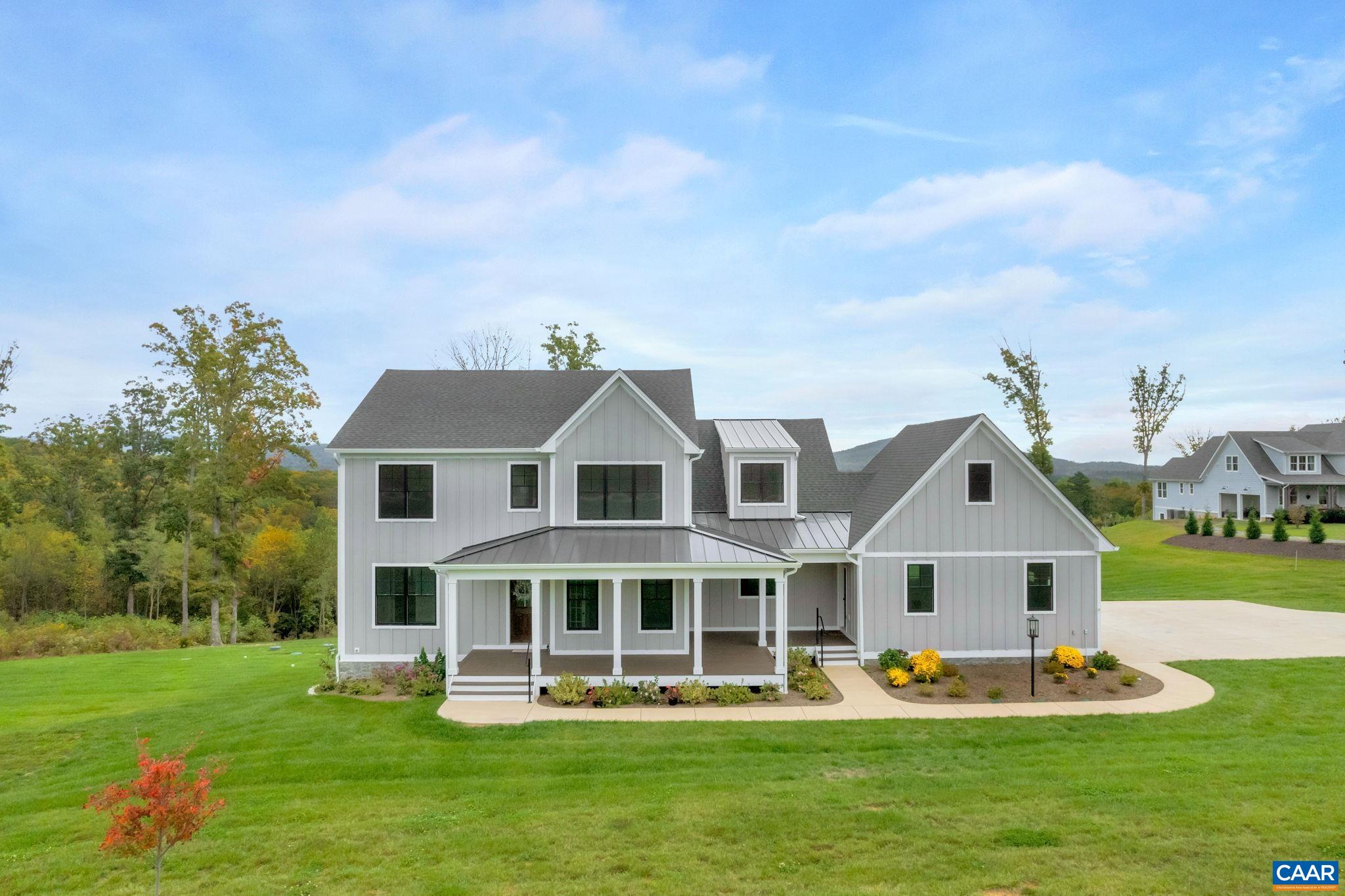 Like new custom home in North Garden's desirable Greenloft neighborhood, just 20 minutes from UVA and 10 minutes to Dr. Ho's Humble Pie! Many luxury touches throughout this home. Spectacular mountain views in all directions, large lot that feels even larger! Borders 68-acre preserve tract. Elevator that serves all 3 levels. Whole-house generator. Primary bedroom is on the second floor, but a generously-sized en-suite bedroom with full bath on the first floor could be used as a primary bedroom as well. Quartz counter tops in the kitchen, gas cooking, finished basement, generously sized storage shed in the back yard. Huge pet (or people!) shower and drying area off the mud room on the main level with many alternate potential uses for this space.