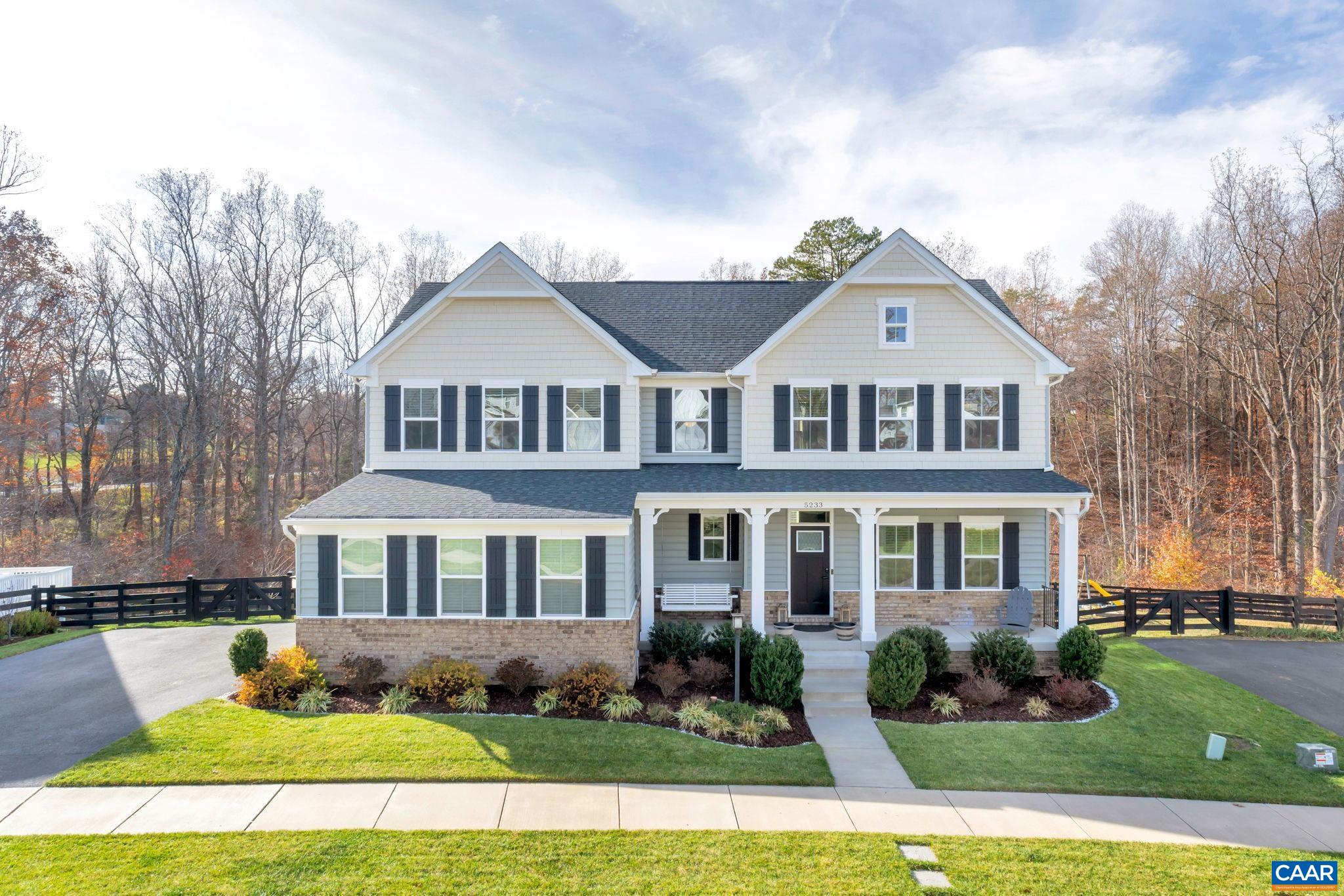 Custom constructed builder employee home in Crozet's popular and convenient Sparrow Hill neighborhood! Just minutes to Western schools, shopping and dining! Situated on a 1/2 acre lot with woods and creek, this 4 bedroom 4.5 bath home is move-in ready. Open floor plan features a stunning kitchen w/upgraded stainless appliances, gas range w/pot filler and vent, wall oven/microwave, large island/breakfast bar, solid wood cabinetry & granite counters. The kitchen opens to the dining and family rooms, and rear covered porch, making a wonderful area for family togetherness and entertaining. Main floor office and craft/play rooms. Master suite with tray ceiling, large walk in closet, and fully tiled bath. Additional 2nd level en-suite bedroom. Huge terrace level family room with climbing wall, full bath, and roughed-in 5th bedroom. The home features LVP flooring, living room fireplace and coffered ceiling, smart home technology, tankless water heater. 12'x25' covered rear porch with sun blinds overlooks the fully fenced rear yard. Play structure & rear creek are favored play areas. Neighborhood path leads to Crozet Connector Trail and Lickinghole Creek. Convenient to all things Crozet, and to Charlottesville and UVA via US250 or I-64.