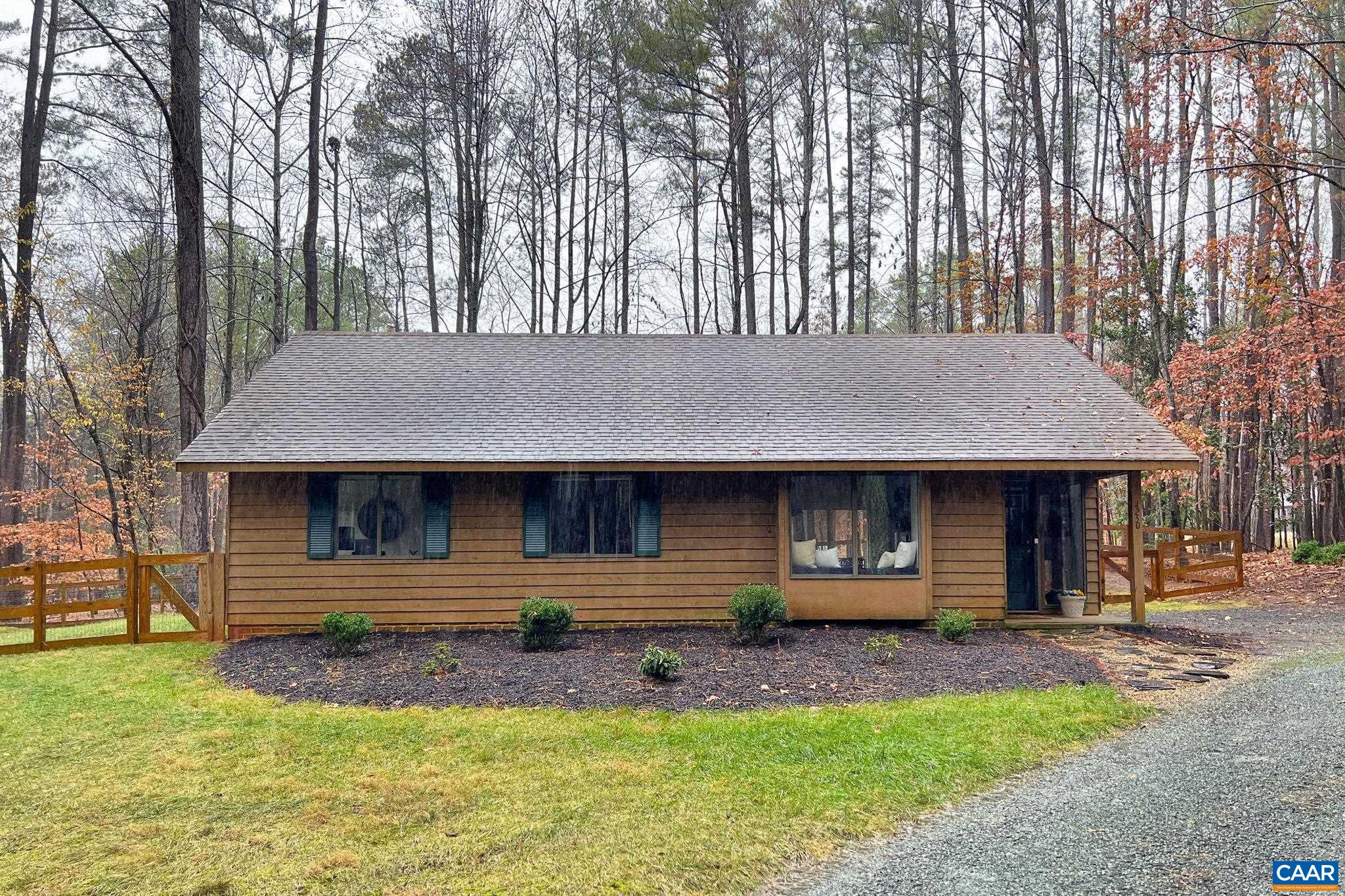 Charming one level cottage on private 1.4 acre lot with a beautifully updated interior. Complete kitchen remodel in 2022: new cabinets, quartz counters, tile backsplash, new appliances, filtered water & pantry storage. Open layout featuring new flooring (no carpeting), new lighting, fresh paint & updated baths. Large, level fenced yard with recently built deck, fire pit seating area & storage shed. Located on a quiet cul-de-sac in the popular Earlysville Forest neighborhood with walking trails, a community garden & multiple ponds. Tranquil yet convenient location  minutes to Hollymead Town Center, NGIC/DIA & Research Park. This is a wonderful opportunity to purchase a move-in ready, detached house with privacy in Albemarle County at an affordable price.