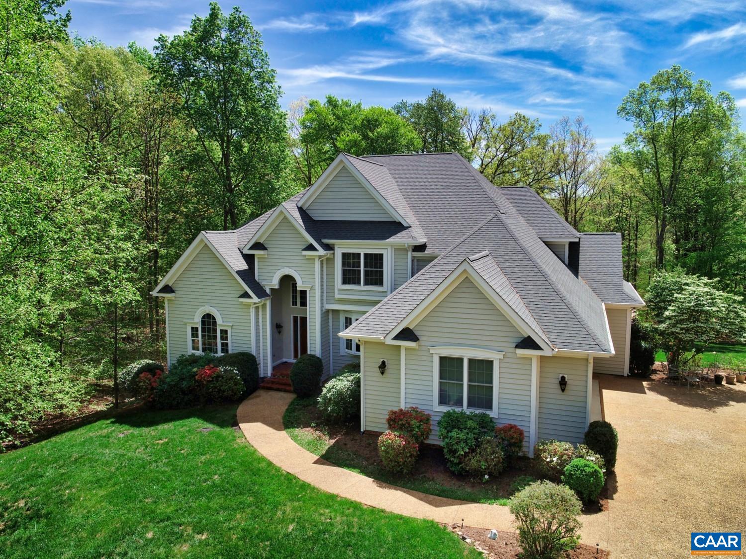 Gorgeous, custom home in the sought after Bentivar neighborhood. Three finished levels with over 6000 finished s.f. The main level features formal living/dining rooms off the main entrance; family room connecting to the kitchen with maple cabinets & solid surface counters. The adjacent breakfast bar / dinette room has a domed ceiling and walkout to the composite rear deck. Primary suite has its own deck and hot tub. Heading upstairs you stop halfway to step into the mid-level office with a wall of windows to enjoy the seasons. The top floor boasts a 2nd BR suite and full bath; two more bedrooms sharing a Jack n Jill bath; a generous exercise/bonus room and a potential 5th bedroom or office (septic is 4 BR design). The terrace/bsmt level has multiple entertainment areas, wet bar and a 4th full bath. Large utility / storage room and sunroom bump out complete the basement level. Two exits to the back yard/patio. Extras include: 3-car garage, 3-zone HVAC, partial house generator, insulated siding, thicker exterior walls, central vac, soft water system, landscape lighting, aggregate stone drive & walkways, shed. Click on the links for a 360-virtual tour and a separate drone aerial tour. No HOA.