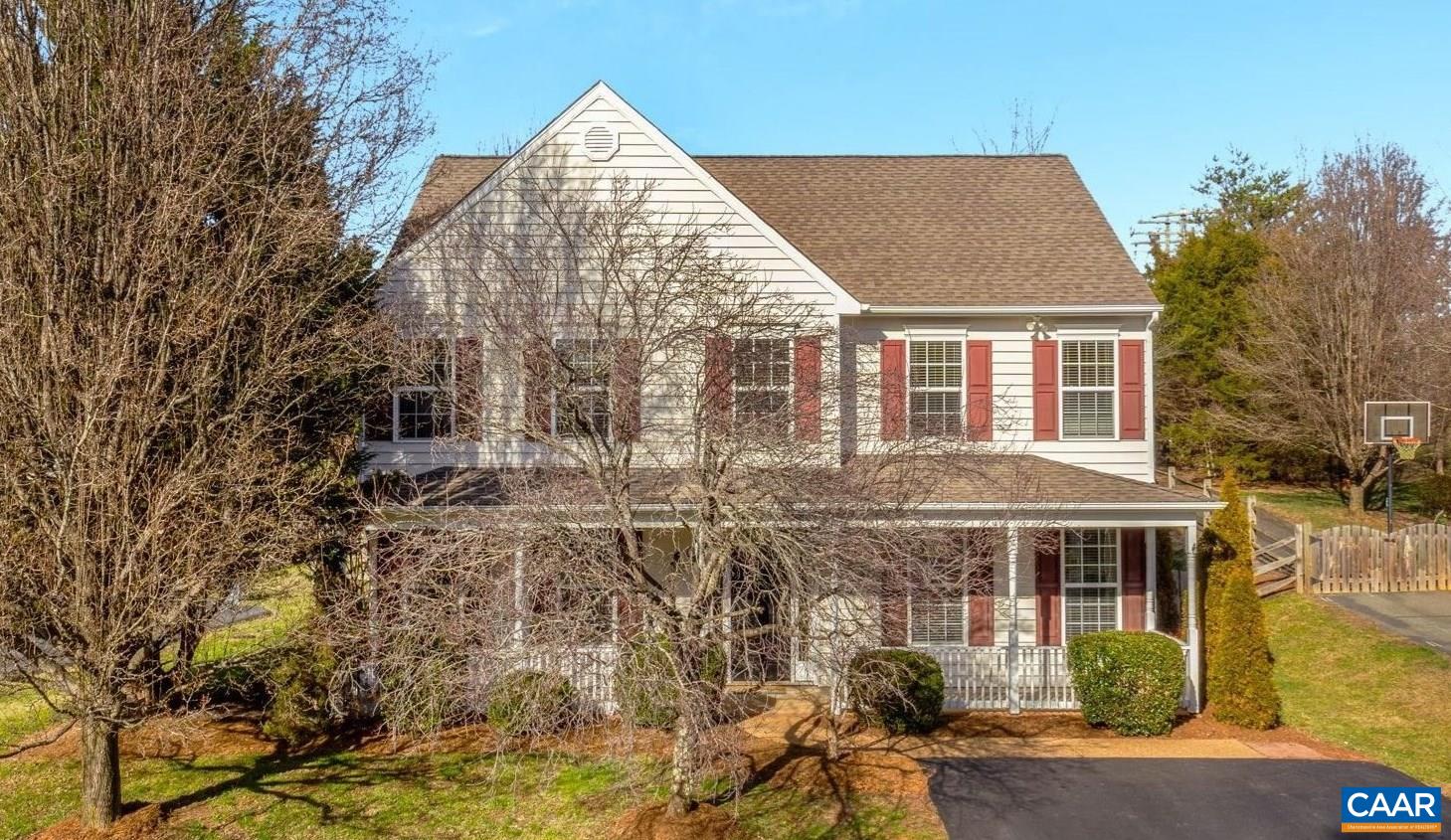 This spacious, single-family home in the desirable Western Ridge Community has been carefully maintained by the original owners, and updated with fresh interior paint and new LVP floors on both levels. The floor plan is perfectly designed for easy living with a proper dining room and office, which leads into the open family room with a gas fireplace that flows to the breakfast nook and charming kitchen. The numerous large windows and french doors on the back of the house let in great sunlight and lead to the generously sized screened in porch which opens to a fenced rear yard with a storage shed and play set. The primary suite includes a dual vanity, jetted tub and shower in the bathroom and walk-in closet. Three more bedrooms and full bathroom upstairs. Western Ridge is highly popular for its abundant amenities, including pool, tennis, fitness gym, clubhouse, playground and social events for the community! Connected to the Crozet Trails and backing to Lickinghole Base and all at the foothills of the Blue Ridge Mountains.