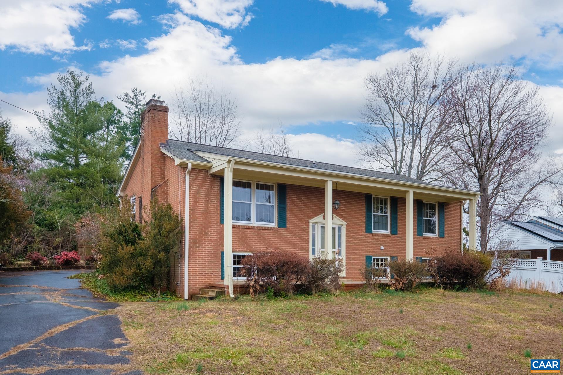 OPEN SUNDAY 3/10 1-3PM Well built home in a fabulous Charlottesville location! Wonderful neighborhood with quiet, wide streets just minutes to downtown, this home is exactly where you want to be! Boasting beautiful hardwood floors, four large bedrooms, a private backyard off of the spacious kitchen with attached dining room, large family room with a fireplace in the basement, this home is ready for your personal touch! High quality roof installed in 2019 and freshly painted in 2023. Low maintenance brick exterior with a 12' wide rear deck. Home is comfortably conditioned with 2-3 window unit air conditioners, 2 are available to convey.