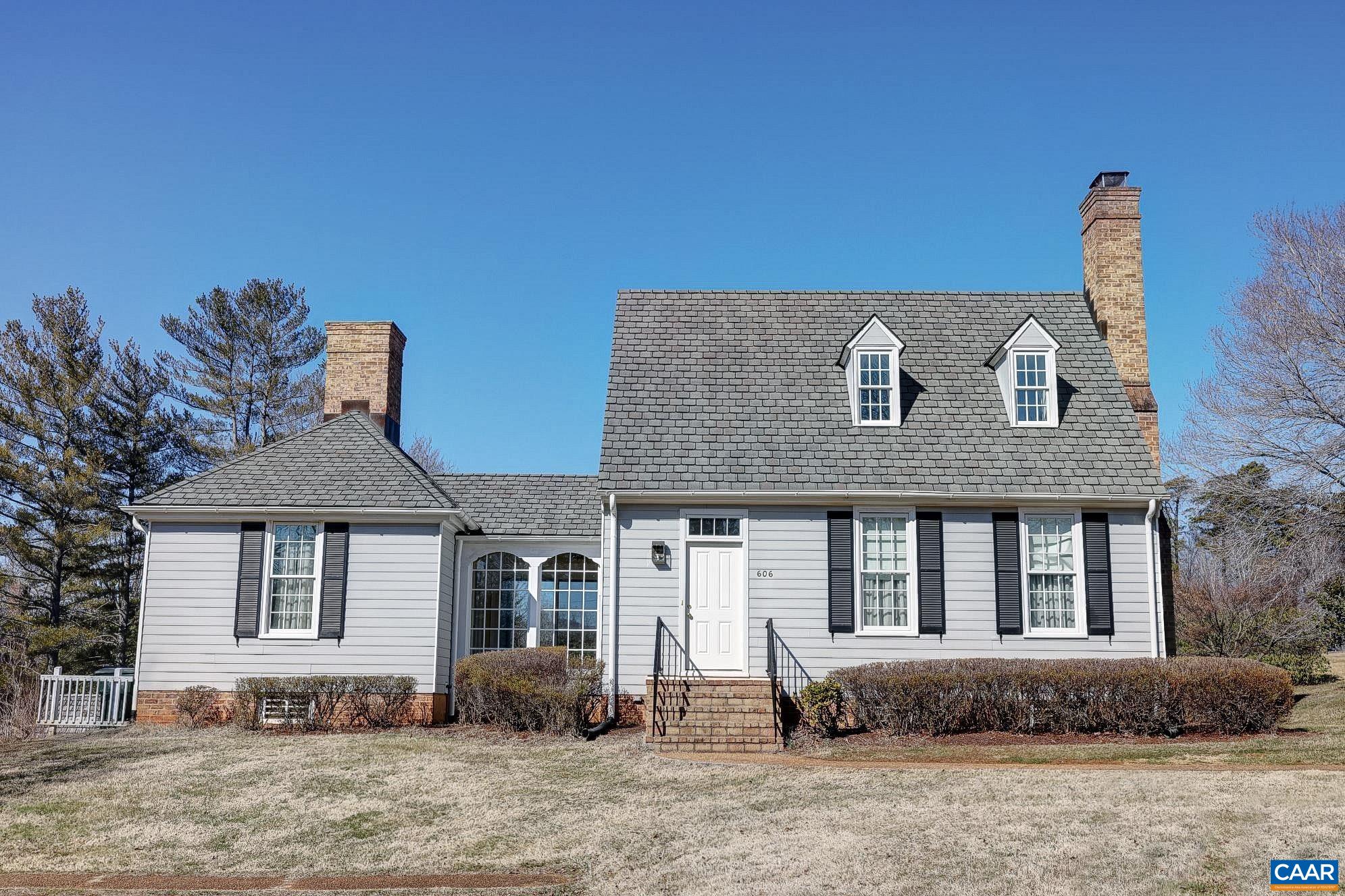 Traditional cottage in Earlysville, on the market for the first time since it was built. One of the original colonial-style huntbox homes in Hickory Ridge, designed by Hank Browne, AIA.  Large living room with fireplace and extensive floor to ceiling bookcases, light-filled dining room, first floor primary suite, and a private second story bedroom with a fireplace, bookshelves, bath, and hardwood floors under carpet.  With classic architectural design elements, this home's systems and structures have been well-maintained, and there is great opportunity for a new owner to create kitchen and baths to their taste.  Beautiful setting with mountain and sunset views.  Whole house Generac generator.  Excellent location in a beautiful area of northern Albemarle.  Firefly Fiber Internet.