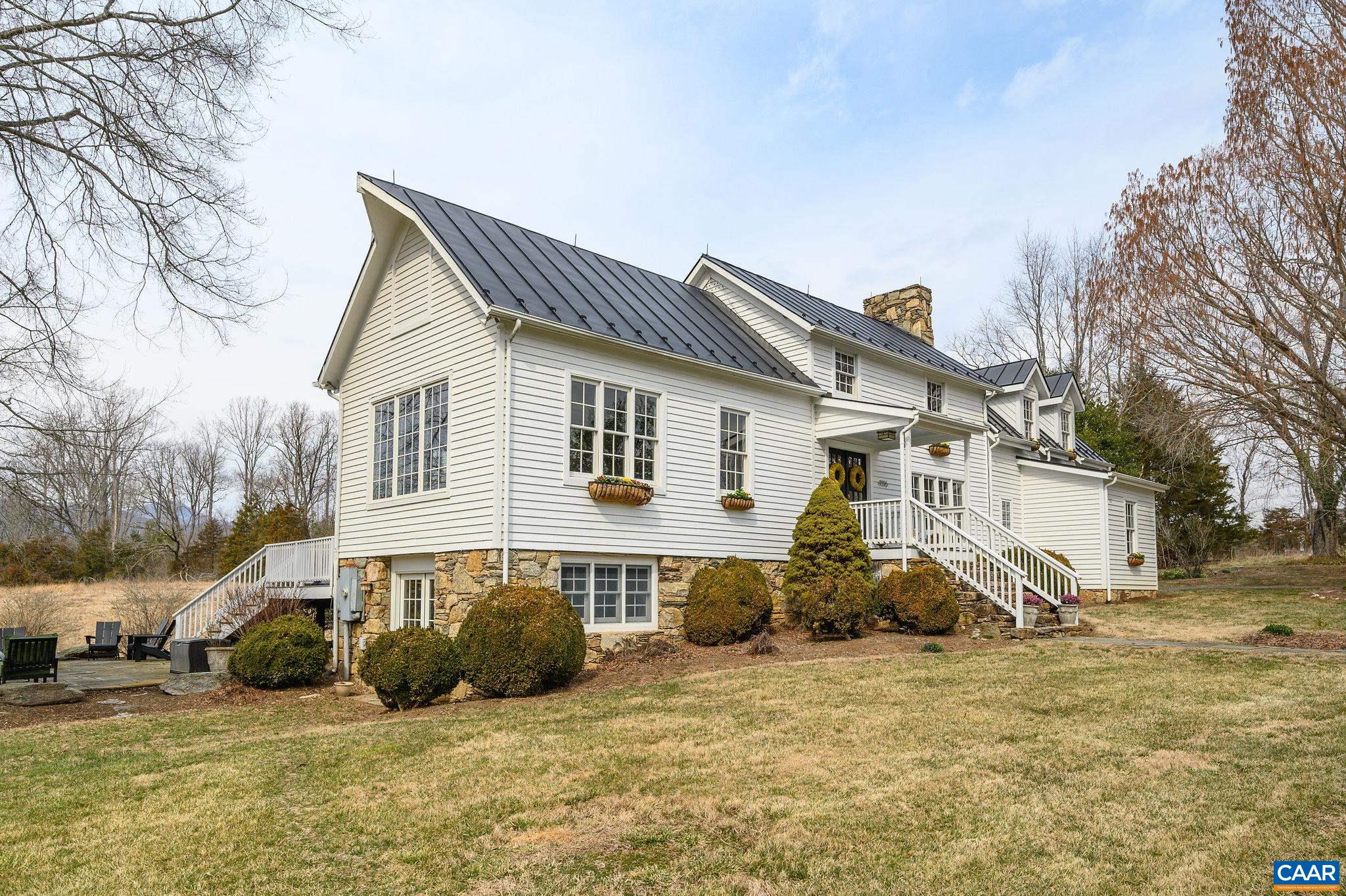 35 acre Rocky Creek Farm is nestled among hunt country estates in Free Union with mountain views. With gently rolling pastures, pond, and several outbuildings, it would be a beautiful equestrian property. The property is a combination of about 25 open and 10 wooded acres with trails and creeks. The renovated and expanded Main House features 5 bedrooms, 4 custom tiled baths, powder room, great room, study with built-ins, a chef's kitchen with gathering room, wet bar with wine cooler, and stone fireplace. A renovated 2 bedroom 1 bath cottage can provide rental income, or additional guest or in-law quarters.  The rustic loft apartment with full bath and kitchenette is currently rented or could be a wonderful artist or writer workspace!