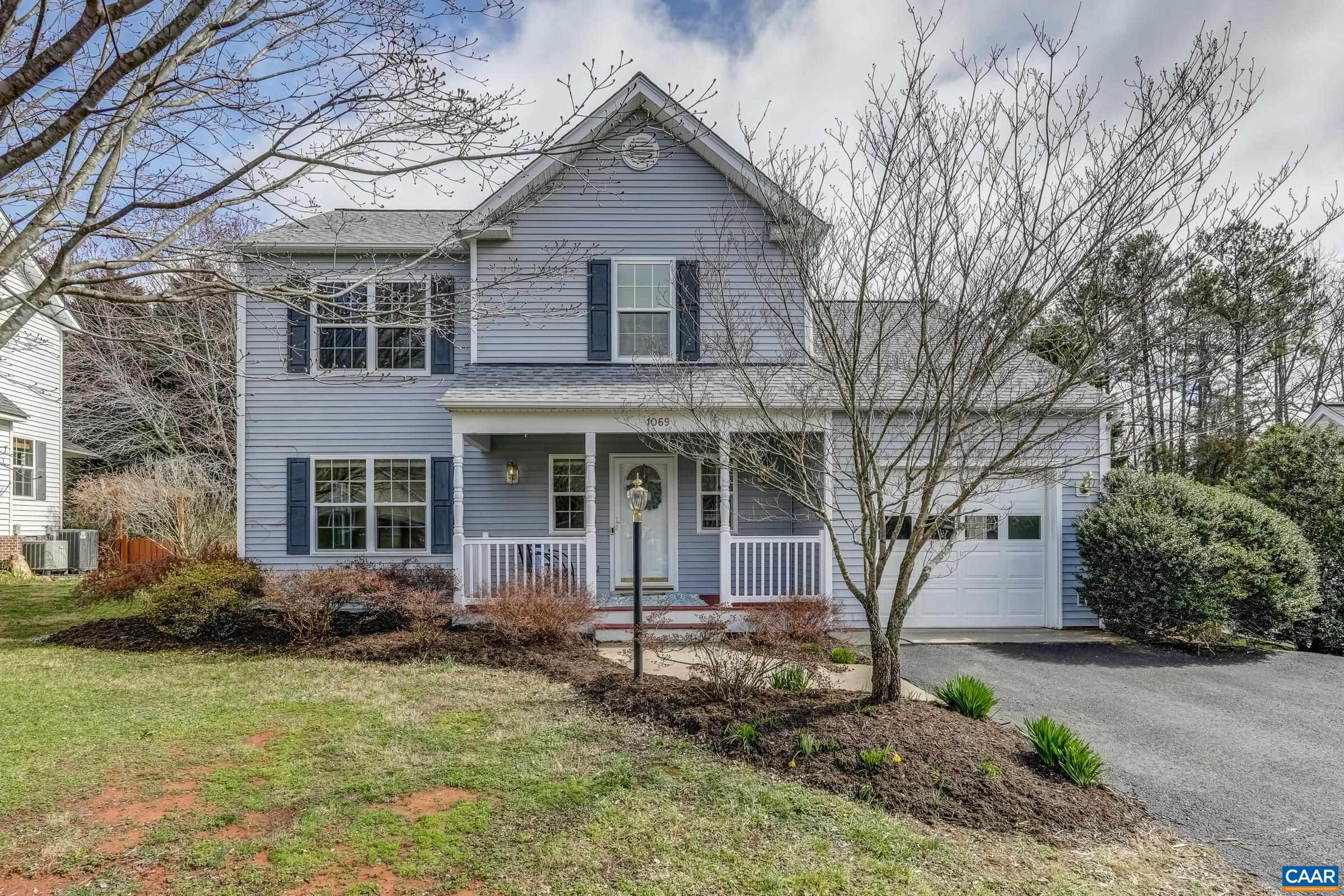 Turn key storybook home on a cul de sac lane with 1-car GARAGE. Step inside from a COVERED FRONT PORCH to refinished HARDWOOD FLOORS throughout the main level. FRESHLY PAINTED top to bottom and UPDATES INSIDE AND OUT. Open kitchen with BREAKFAST BAR, QUARTZ counters and PANTRY that flows into a bright family room with glass slider door to DECK. Living/dining room make one big space. Upper level owners suite with vaulted ceiling, WALK-IN CLOSET and attached bath with linen closet and DOUBLE SINK VANITY. Two additional bedrooms and full hall bath complete the second floor. Nice size DECK steps down to a PAVER PATIO and FULLY FENCED level yard. Store your garden tools in the STORAGE SHED with a new roof. Unlatch the gate right out your backyard to a NATURE TRAIL and manicured COMMON AREA! Ting high-speed internet. NEW carpet (2024). Variety of NEW Pella WINDOWS & quartz kitchen counters (2023). NEW roof (2020). NEW water heater (2019). Encapsulated crawl space. 6 mins to UVA hospital. 8 mins to UVA Grounds. This is the one you've been waiting for in Redfields!