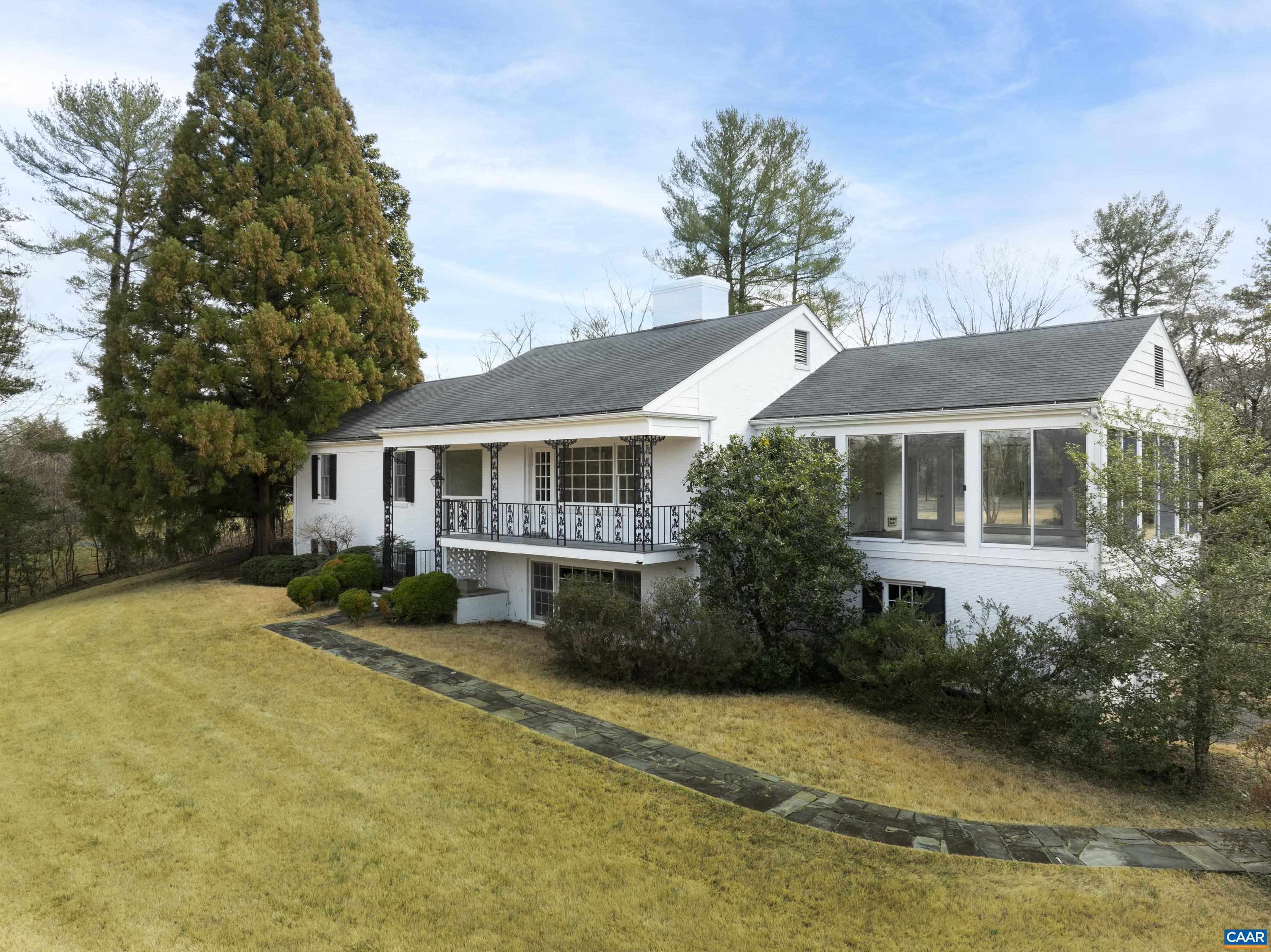 First time on the market, this rock-solid residence, built in 1961, is ready for its first, full renovation.  Positioned on an elevated site at end of a long drive and surrounded by nearly 2 acres of lawn and formal gardens, this home enjoys unparalleled privacy in a very bucolic setting, minutes from town and the University. The quintessential, Charlottesville offering that is so hard to find: quality construction, a secluded setting and uber convenient location to Barracks Road shopping and all things west of town. The Colthurst neighborhood is a gem; quiet yet close to everything. OPEN HOUSE SAT 3/16 AND SUN 3/17 12-2PM