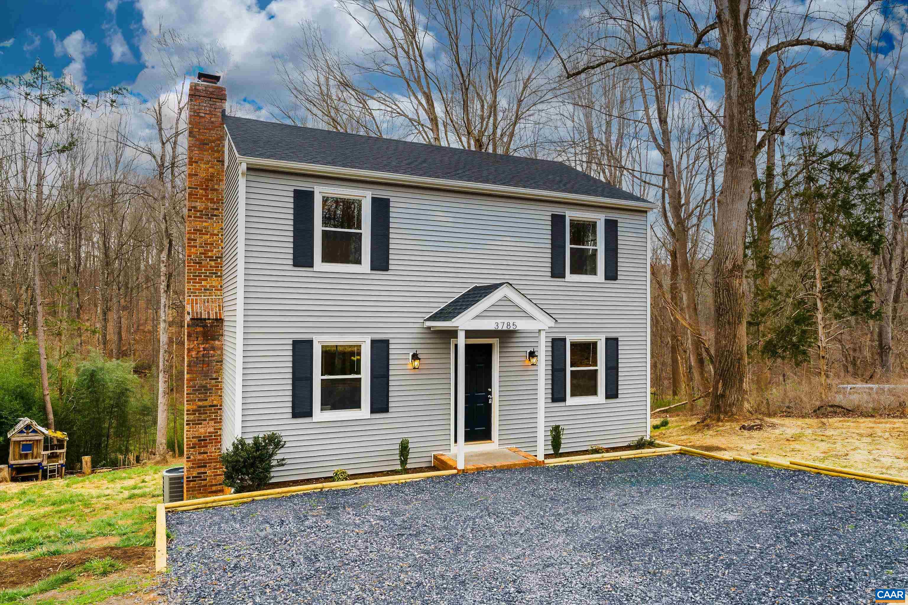 Seeking Charlottesville conveniences but desire country living? Here's your best-of-both-worlds location on 2.27 acres at the end of a private cul-de-sac in the Ivy/Crozet area! Oh, and a NEW ROOF! Come inside from hanging by your firepit, exploring wooded trails, relaxing in the adult sized swing, flying down the zipline, or enjoying coffee on the brand new rear deck. The main level hosts open plan kitchen/dining room with a half bath and living room with fireplace. Upstairs, master bedroom w master bath, 2 additional bedrooms and full bath. In the fully finished basement, living room, laundry room, full bath, and bonus room could be used as extra living space or even converted into an accessory dwelling unit ADU with county approval. No HOA, Central heat & air just serviced, & professionally cleaned... all ready for new ownership!