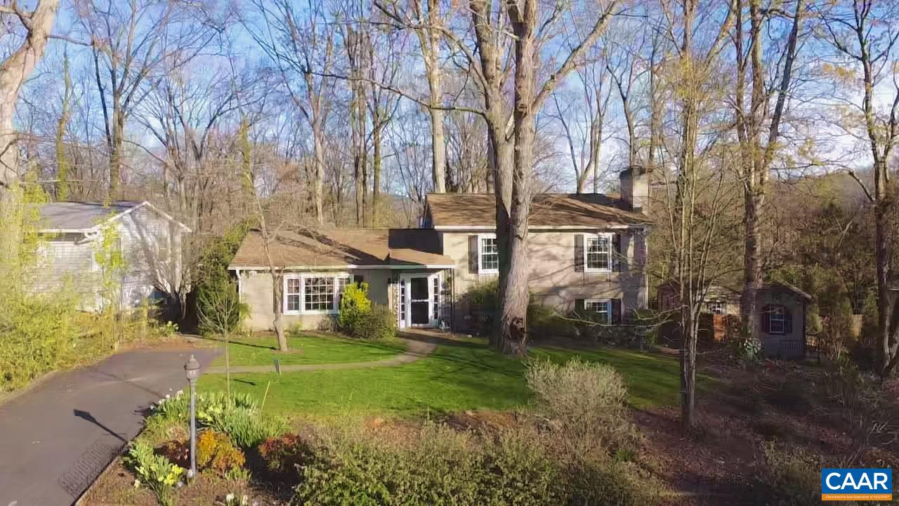 Don't miss out on the remodeled modern gem located in desirable Johnson Village! Extensive remodeling including kitchen and all appliances, baths, incredible new porch addition, water heater, 2016 HVAC, 2016 roof with 30 year shingles, extra insulation in attic, plumbing and more completed by current owners.  Gorgeous hardwood flooring throughout the home. Beautiful wooded and private lot located within easy walking and biking distance to Johnson school, Uva, hospital, Fontaine and downtown.  4th bedroom option on terrace level.  Current owners removed closet to build book case but it can be converted back to a closet easily...or remain as a home office. Also rough in for a half bath on the terrace level. Two recent sheds complement the property and add extra storage.  Rear property is fenced. No HOA!