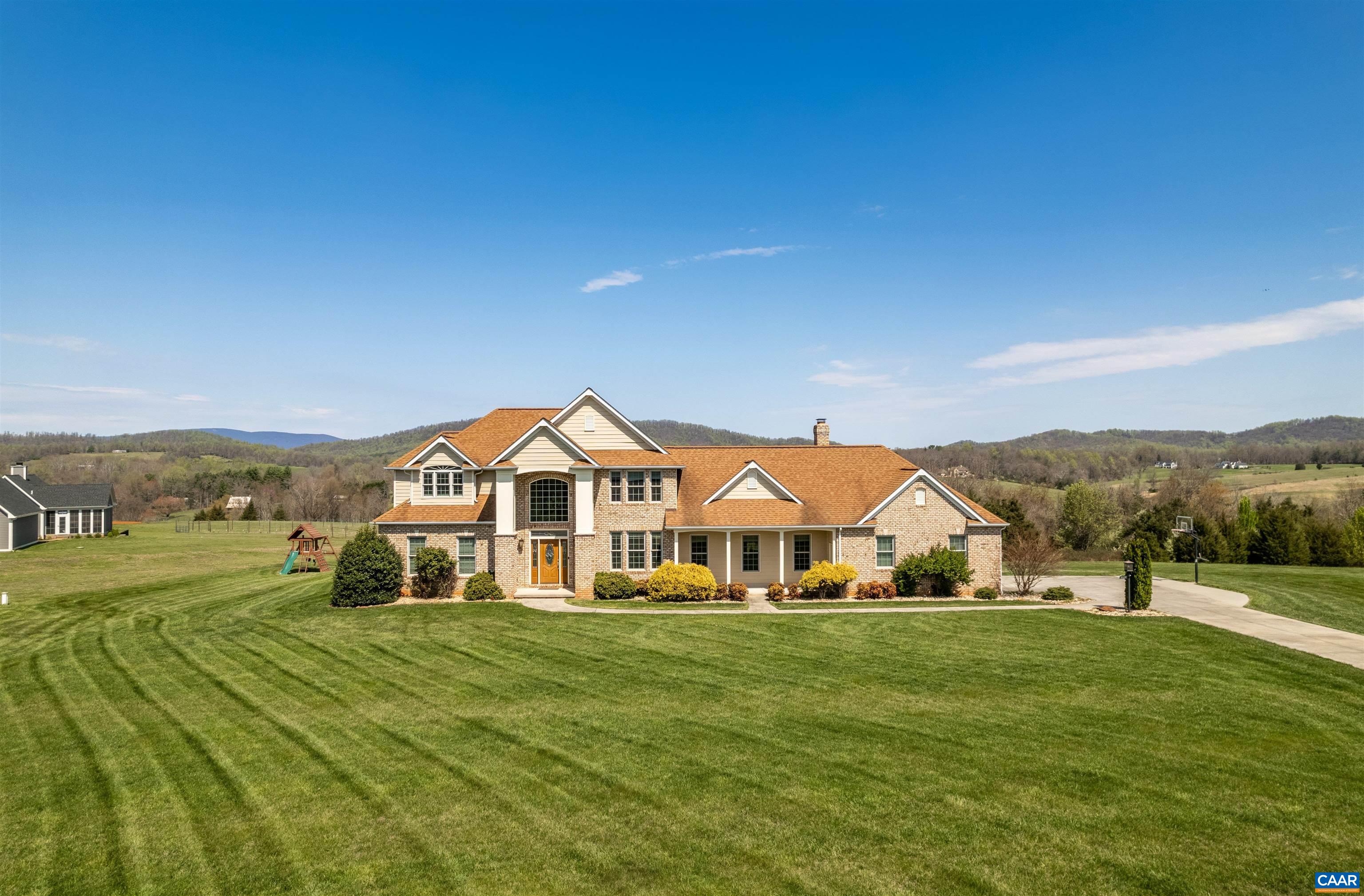 Nestled amidst picturesque surroundings in Southern Albemarle, this home offers breathtaking mountain views visible from nearly every room. Features include two primary suites, gourmet eat-in kitchen with top-of-the-line appliances, recessed lighting, built-ins, and more. The large partly finished basement consists of bonus room and an ample storage room. Large patio, salt water pool, and two car garage.