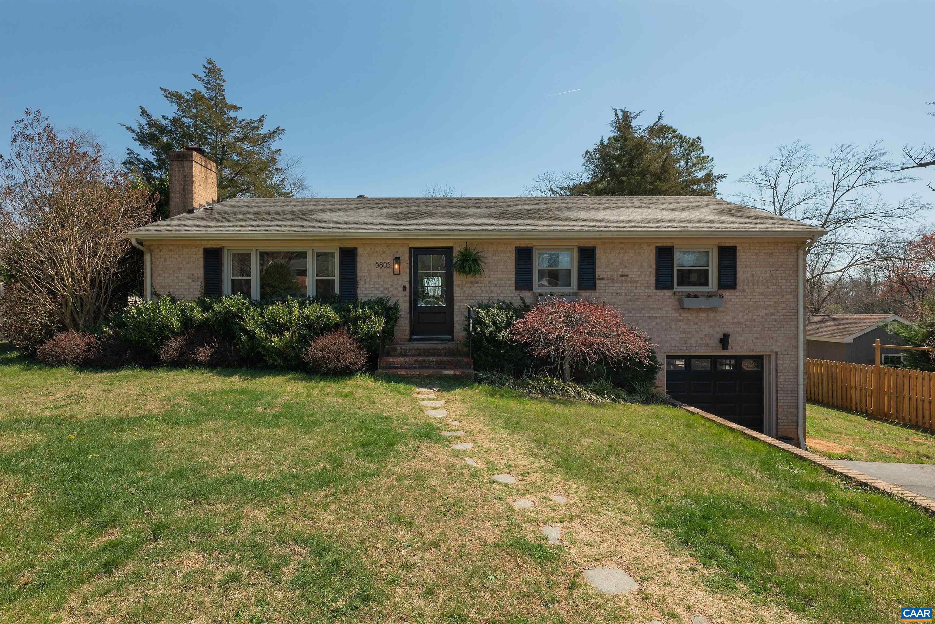 Thoughtfully and tastefully renovated....move-in ready....hardwood floors, brick fireplace, fantastic kitchen, super cute baby's room...  full basement with family room, workshop/storage and one car garage... screened porch, large deck...great yard with garden spot and room to play...mountain views...quiet street...in a great neighborhood walking distance to downtown Crozet...