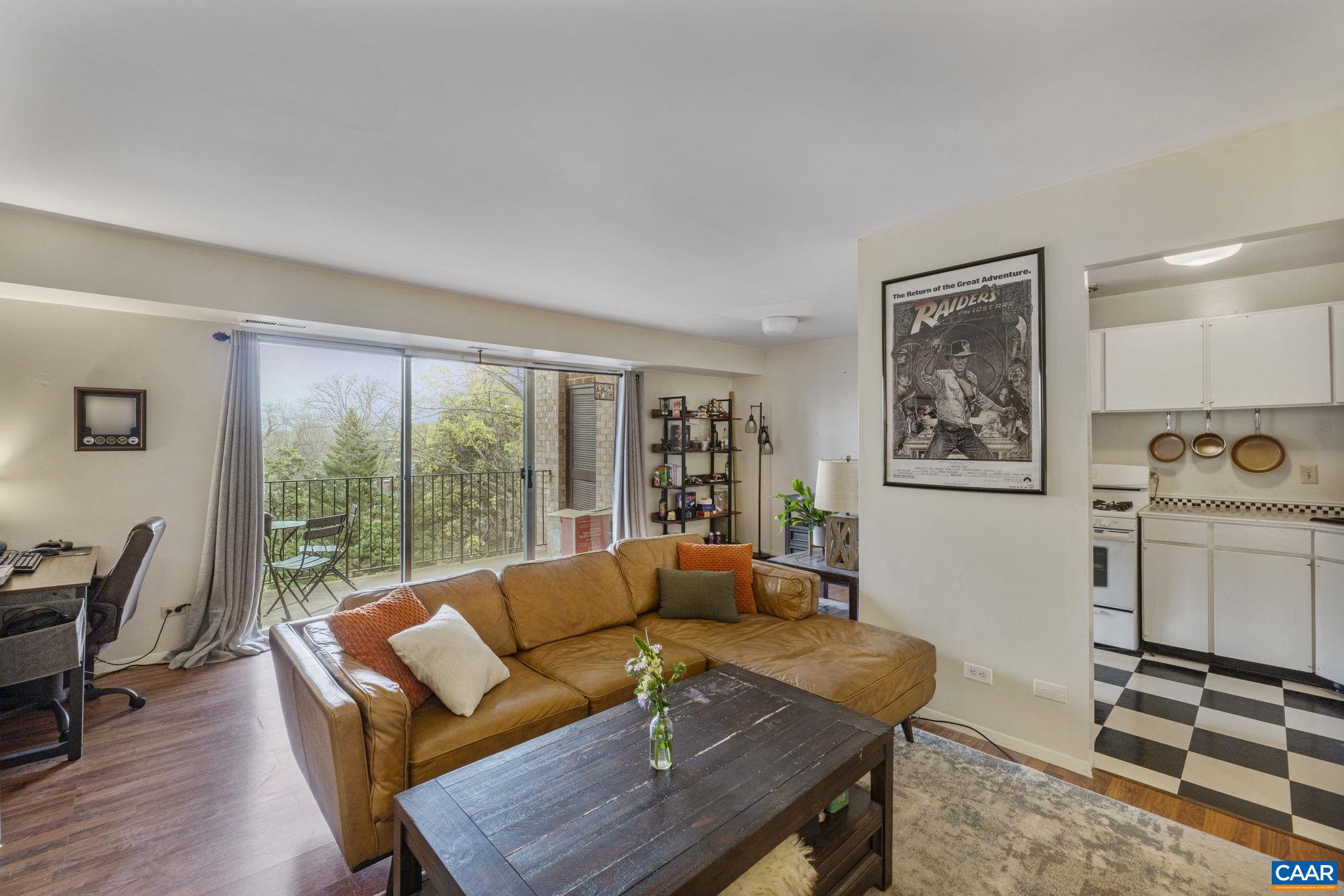 Discover city living in this condo located on the TOP FLOOR, nestled in highly coveted North Downtown Charlottesville for under $250,000! A wonderful opportunity for someone to update and make this space as they wish. Enjoy one-level living with a private balcony offering lush green views. With its prime location just steps away from downtown attractions, including restaurants, entertainment, farmers markets and more, and a leisurely stroll to UVA, enjoy the perfect blend of low-maintenance lifestyle and vibrant urban living. Condo is now vacant and ready for move in!