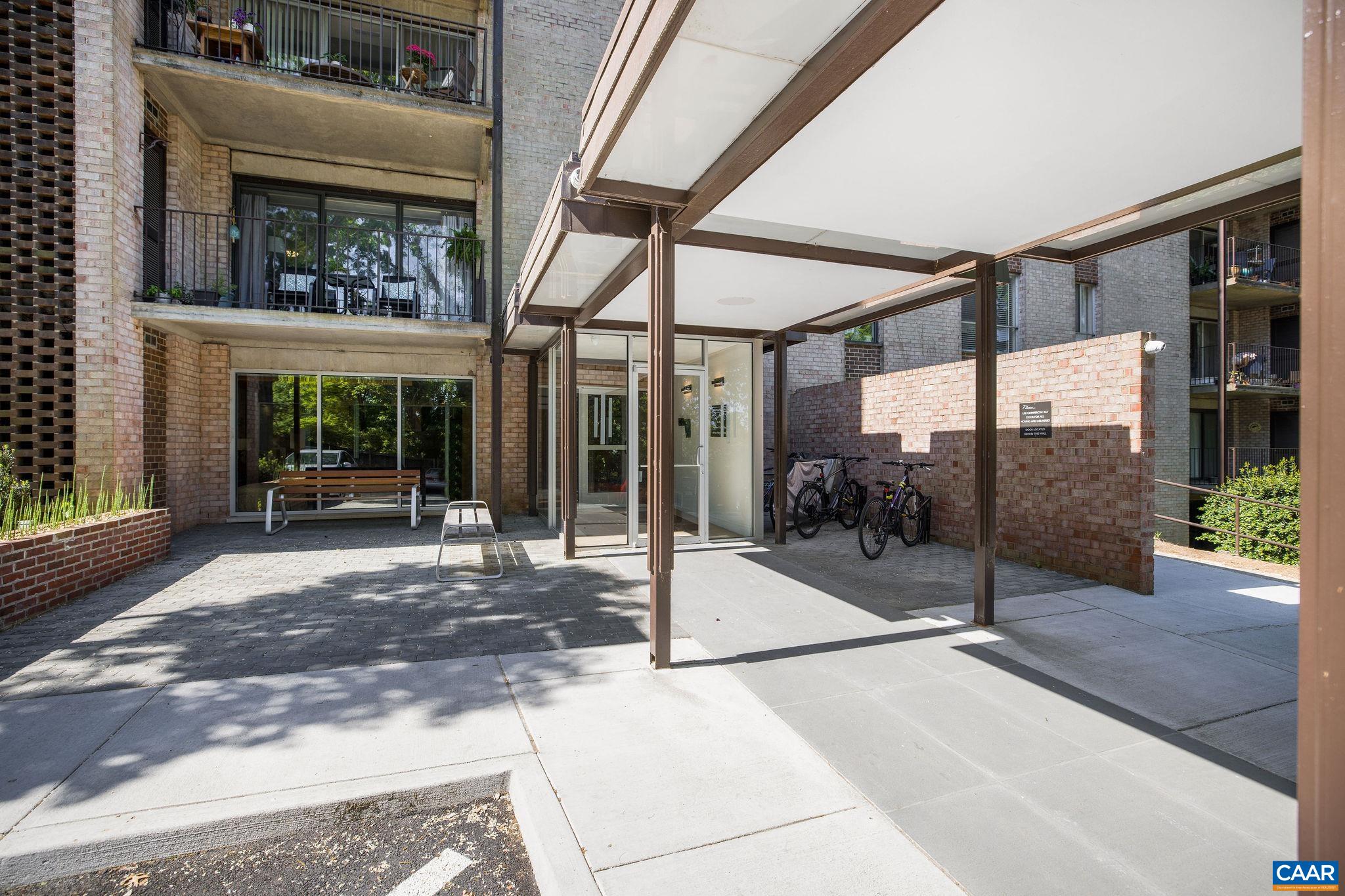 Pristine, remarkably private, quiet, renovated 1st floor condo on one of North Downtown's prettiest streets. Stroll to the Downtown Mall along historic streets or bike to the University & Medical Center in minutes. Unlike most condos in this building, occupants can come and go from the unit at its slider doors onto the covered patio and then out to parking located close by.  No need go through the lobby or use the elevator. There is a nice pop of nature to enjoy from the patio with flowers and a bamboo privacy screen.  Owners installed mini-split HVAC unit for remarkably efficient and reliable heating and cooling. This source of heat and air is quiet and can be controlled remotely. The laundry center is conveniently located 1 floor down from this unit.  Welcome to Downtown living at its best!