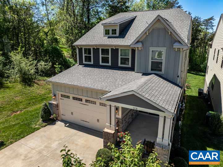Luxury home in Cascadia awaits you with superior vista views of the Blue Ridge mountains, Darden Park and Meadowcreek Golf Course. Enjoy the sights from your custom built screened porch or come inside for an open concept great room, kitchen and formal dining plus home office - all with 9 ft ceilings and plenty of natural light. Kitchen offers gas cooking, stainless appliances, breakfast bar and eat in kitchen area. Upstairs welcomes you with a primary bedroom suite featuring tray ceilings and ample bath plus a generous walk in closet and 3 other bedrooms and separate laundry room. Naturally light finished basement has expansive open area for family fun, work out area and loads of storage. Outside is a cosy patio and fire pit perfect for grilling marshmallows, sipping something wonderful and enjoying the mountain views. Cascadia is amenity rich with a large outdoor pool, clubhouse, 2 playgrounds, walking trails and sidewalks. Less than 10 min. walk to Darden Towe Park, easy drive to I-64, Sentara Martha Jefferson Hospital yet perfect proximity to all of Charlottesville. If offers are received, Sellers will review Monday the 22nd at 5 PM.