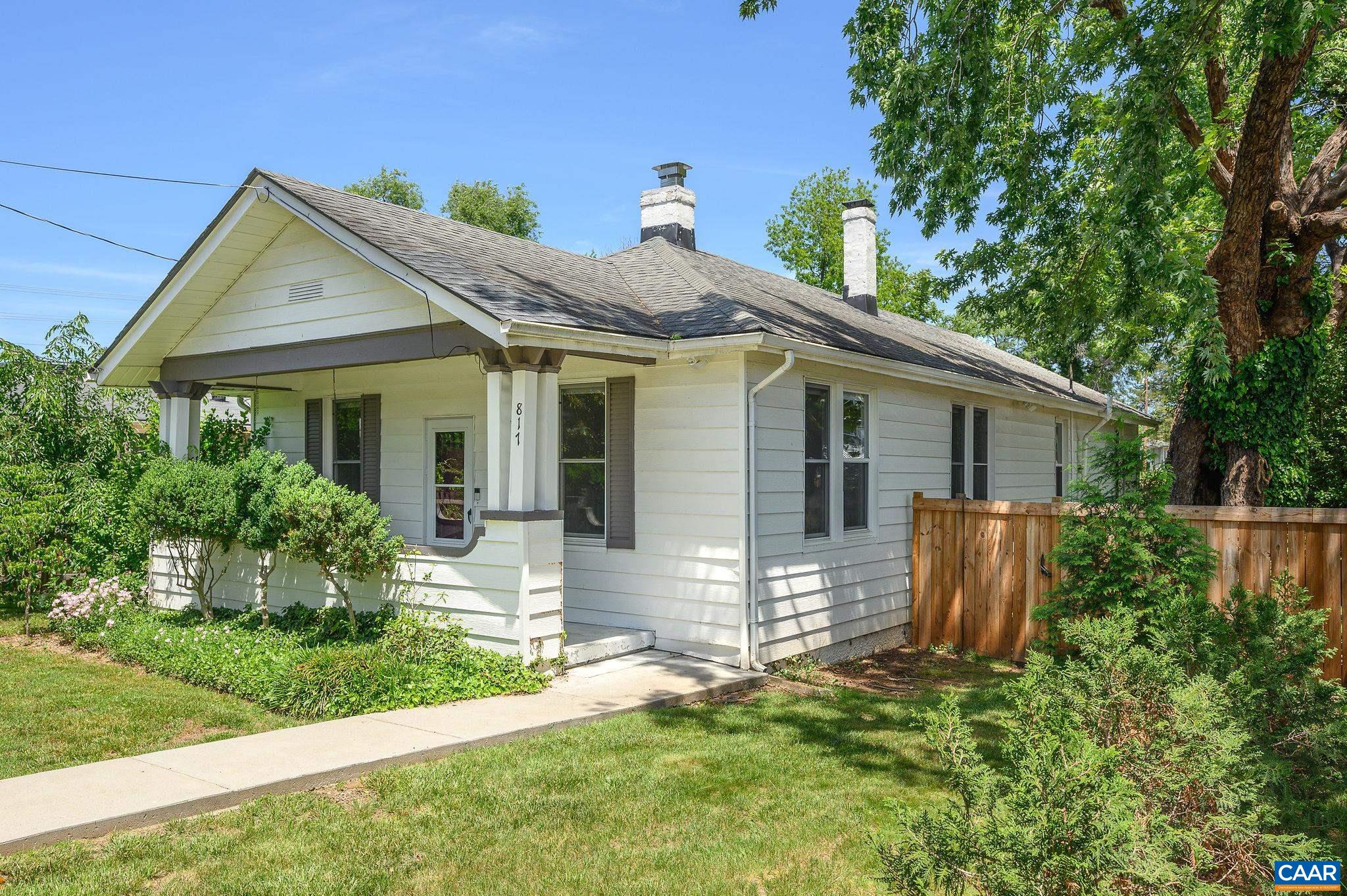 Charming, renovated city bungalow, less than a half mile from the historic downtown mall. Even closer to the vibrant Dairy Market and restaurants of the Preston corridor. Two- minute walk to Marie Bette.  Centrally located with easy access to UVA, all city services, schools, parks, the 250 bypass, with mountain view and much more. This charmer is a perfect base for all that Charlottesville has to offer! High ceilings, large windows, quality interior moldings, hardwood floors, newly renovated marble kitchen and bath, single-floor living. Relax on the front porch, enjoy the fully fenced yard with privacy fence in back, many mature and recently planted trees. 90 out of 100 walk score. Plus, alley access for parking. Forrest View Condos are the neighbors to the right. Each condo townhome is individually owned. Be sure to note the Features and Improvements in the Documents section.