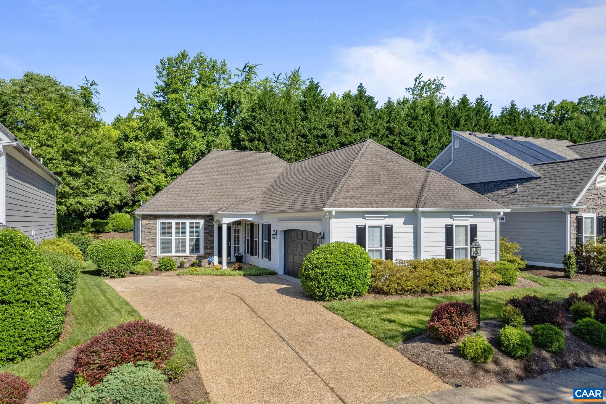 Elegant and updated one-level home in the desirable Stonegate community in Western Albemarle. Enjoy the private, beautifully landscaped yard with spacious deck and mature landscaping.  Low maintenance living with most exterior maintenance and landscape care provided by the HOA. Conveniently located just minutes from the Blue Ridge Trail, Crozet and Charlottesville shopping, restaurants and entertainment. This home has new neutral paints, new modern fixtures and stylish decor throughout. Enjoy the vaulted great room with skylights and wall of windows with new, modern window treatments. Host holiday meals in the light-filled dining room and enjoy the large, functional kitchen with stainless appliances including new dishwasher, range and microwave. Plentiful storage in the neutral maple cabinets and large pantry with room for casual dining in the breakfast nook too. The beautiful main-level primary suite features two closets and a private bathroom with soaking tub and separate shower. Two additional bedrooms share a full bathroom with new lighting and flooring. This lovely home features a patio from which you can enjoy the beautifully maintained plantings and the private back yard. 2 car garage and floored attic for storage too!