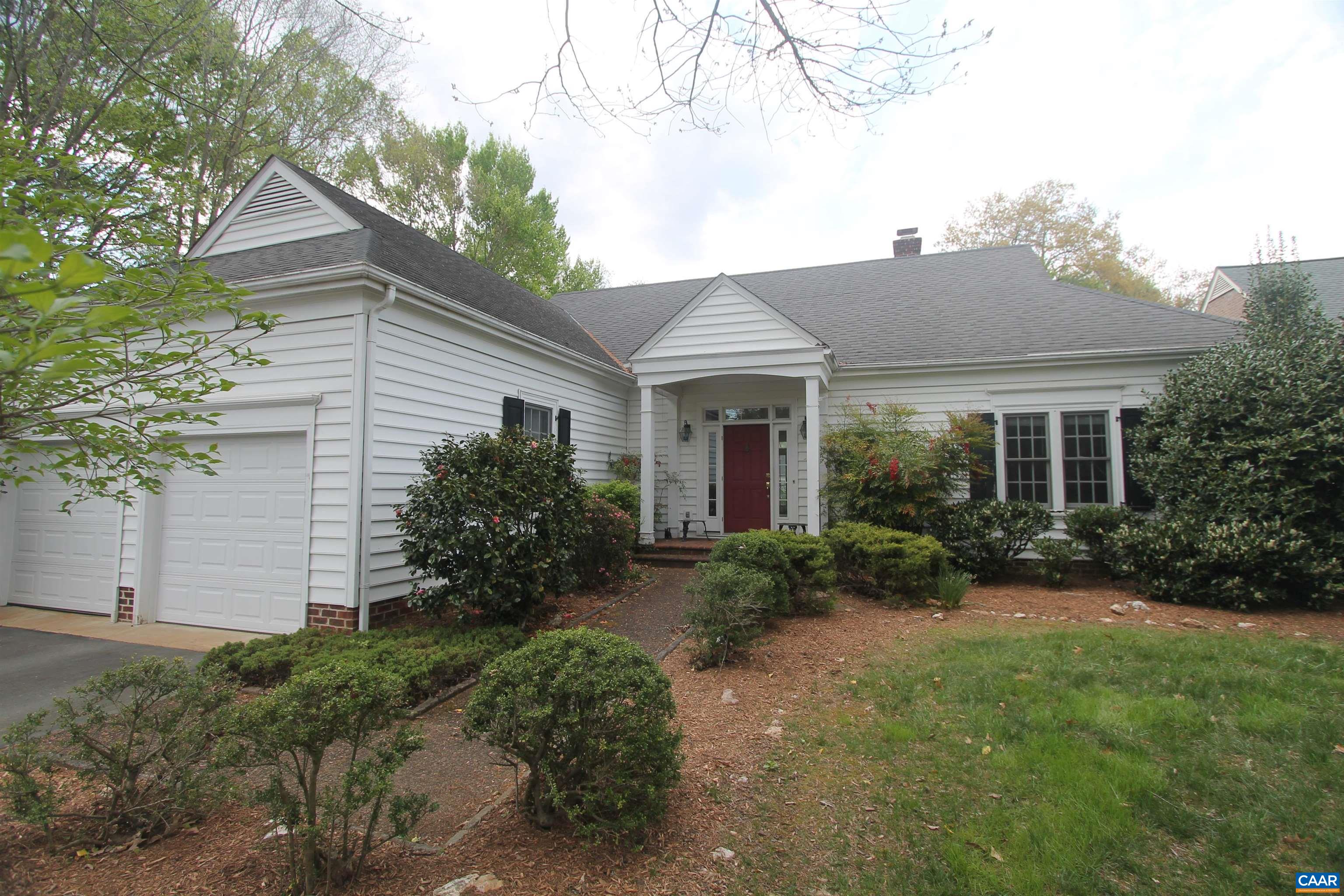 Cozy Cottage on a private corner lot.  With a little TLC this home is perfect for those seeking one level living.   2BR each w/private bath, sun room off the dining room, vaulted ceilings, large Living Room w/fireplace, hardwood floors, convenient kitchen w/large pantry. 2-car garage.