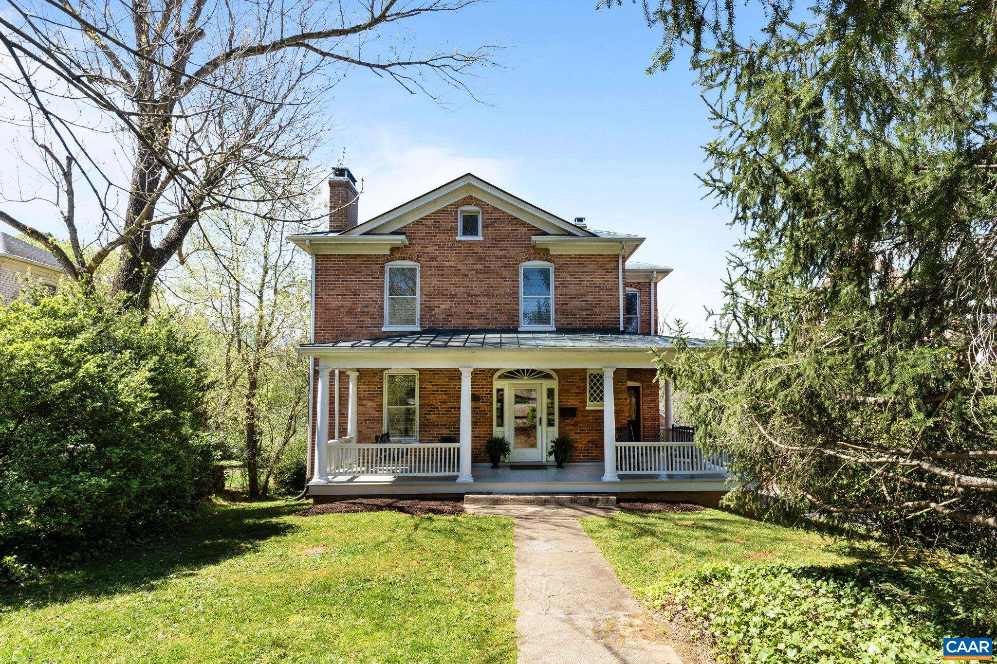 INCREDIBLE NEW PRICE!!! Walk downtown, to the river, to the park! Enjoy all that Charlottesville has to offer, while living in this charming home in the historic district of Locust Avenue.  The quality craftsmanship has been well maintained through the years.  The wide center hall will invite you in to enjoy nine foot ceilings, maple floors, and five panel doors.  The first floor has a living room, dining, kitchen, office, and a full bath while the second floor has four bedrooms and a hall bath.  Do you need more space? The unfinished basement boasts almost 1,100 sf and 9 ft ceilings, so there is tremendous value and opportunity for expansion. There is also plenty of room to bump out the back for a grand addition if you choose! The gravel parking area allows for two off street spaces. This home is a must see!