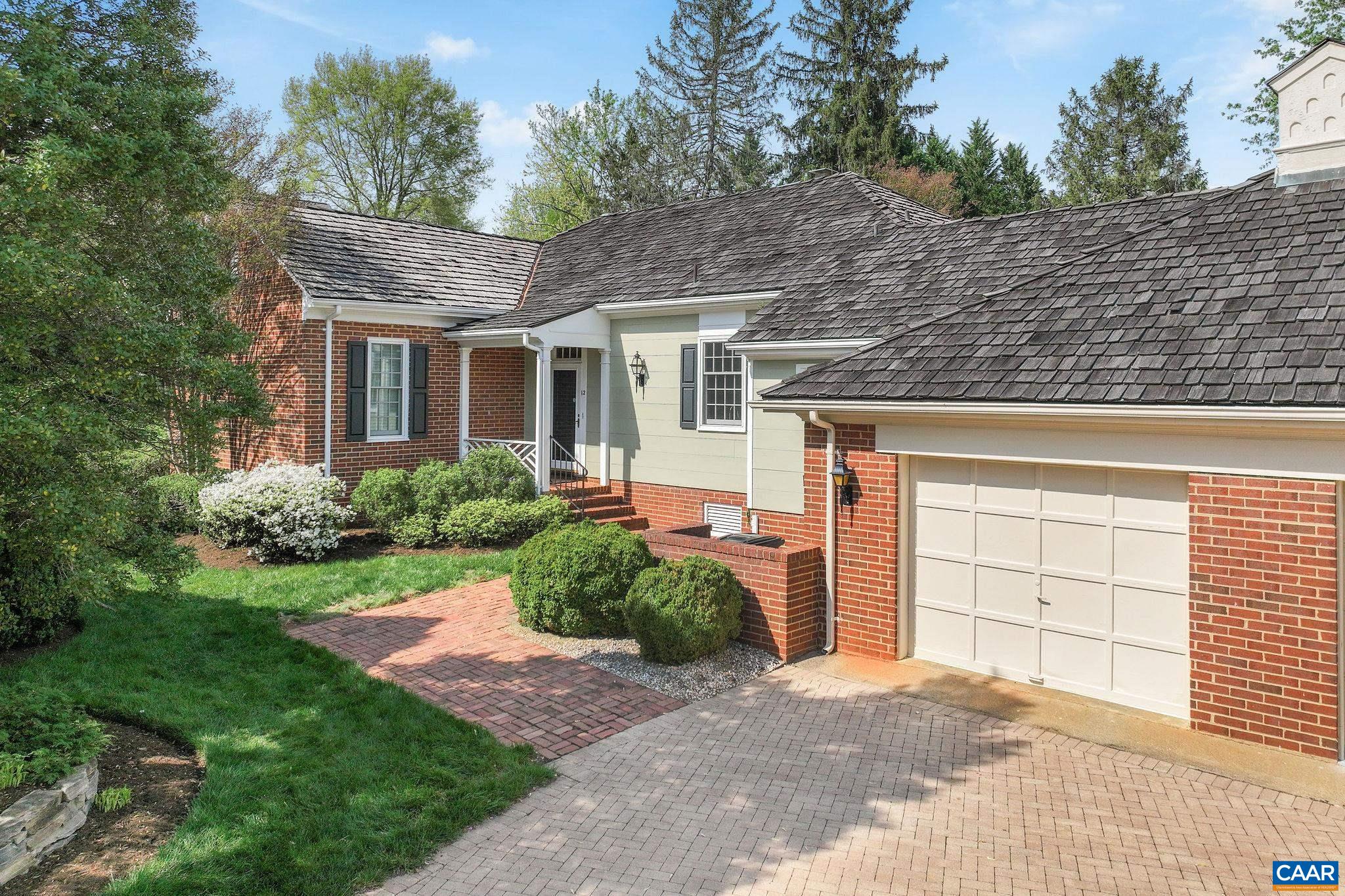 OPEN HOUSE 9 am - 11 am on May 14th in EDNAM VILLAGE! Welcome to your dream home near the prestigious Boar's Head Resort, where luxury meets convenience! This traditional, attached home offers privacy and convenience - nestled among brick residences and lush landscaping. The home boasts two spacious bedrooms and two full baths. The renovated kitchen features exquisite finishes, quality cabinetry and a wet bar. You'll appreciate the floorplan with the ideal balance of formal and casual spaces, including a dedicated home office plus a sunroom surrounded by vibrant landscaping. The formal dining room with built-ins is perfect for hosting elegant gatherings, while trim detail and hardwood floors add a touch of grandeur throughout the home. The living room is the heart of the home with a stately wood burning fireplace and space to relax or entertain. Storage is no issue here, with excellent built-in options, a convenient one-car garage, and attic space. Ideal as a primary residence or the perfect lock and leave home - you'll love the proximity to tennis, golf, spa, restaurants, and hiking trails. Ednam Village offers the ideal blend of serene living and active lifestyle amenities. Floor plan included with photos.