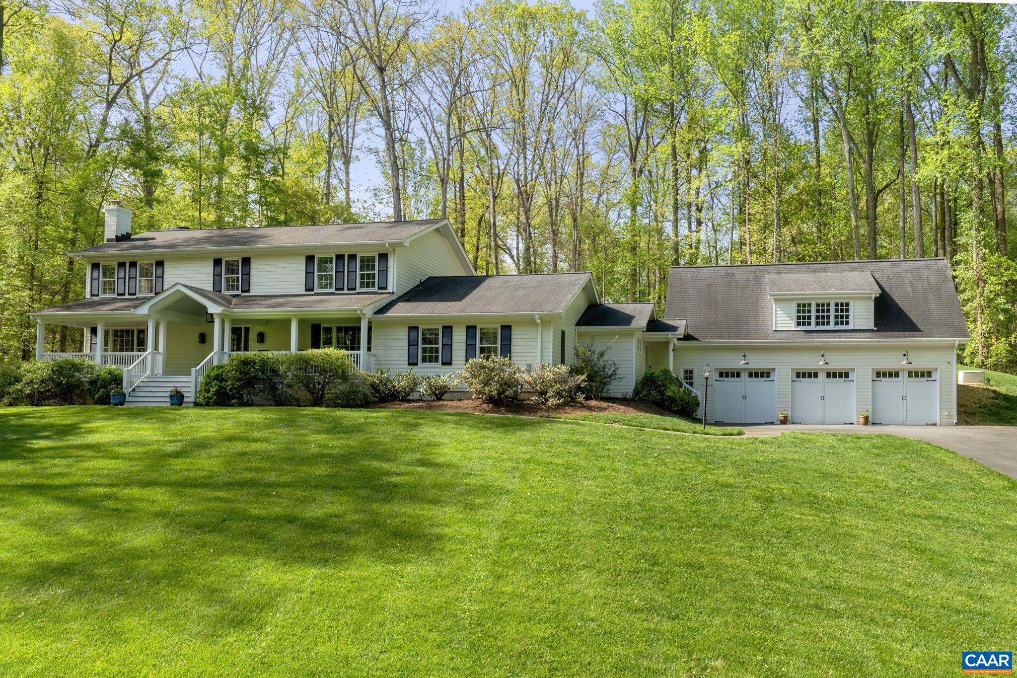 In coveted Flordon, this four-bedroom home with several formal and informal living spaces, a three-car garage, and a terrific lot is must-see. Its seamless floor plan is perfect for entertaining. There are two open living rooms with wood-burning fireplaces, plus a private patio off the large family room, all equipped with a built-in sound system. Kitchen highlights include custom concrete countertops, a gas stovetop, two ovens, and a new refrigerator and oven/microwave combo. There is a mudroom with ample storage space and custom cubbies, as well as a generator. A comprehensive renovation by Baird Snyder added the garage with a great room above it, which features a large living space and full bathroom, offering many potential uses. Other improvements by the current owners include a new roof, refinished floors, overhauled landscaping, and an expanded front porch (2015), plus custom blinds and updated bathrooms with new vanities, showers, cabinetry, and tile (2017).This is a remarkably private lot, even for Flordon, that achieves the impossible: a flat field in the back yard. Enjoy proximity to all things Charlottesville, UVA, the Downtown Mall, myriad conveniences, Western schools, private schools, and more.