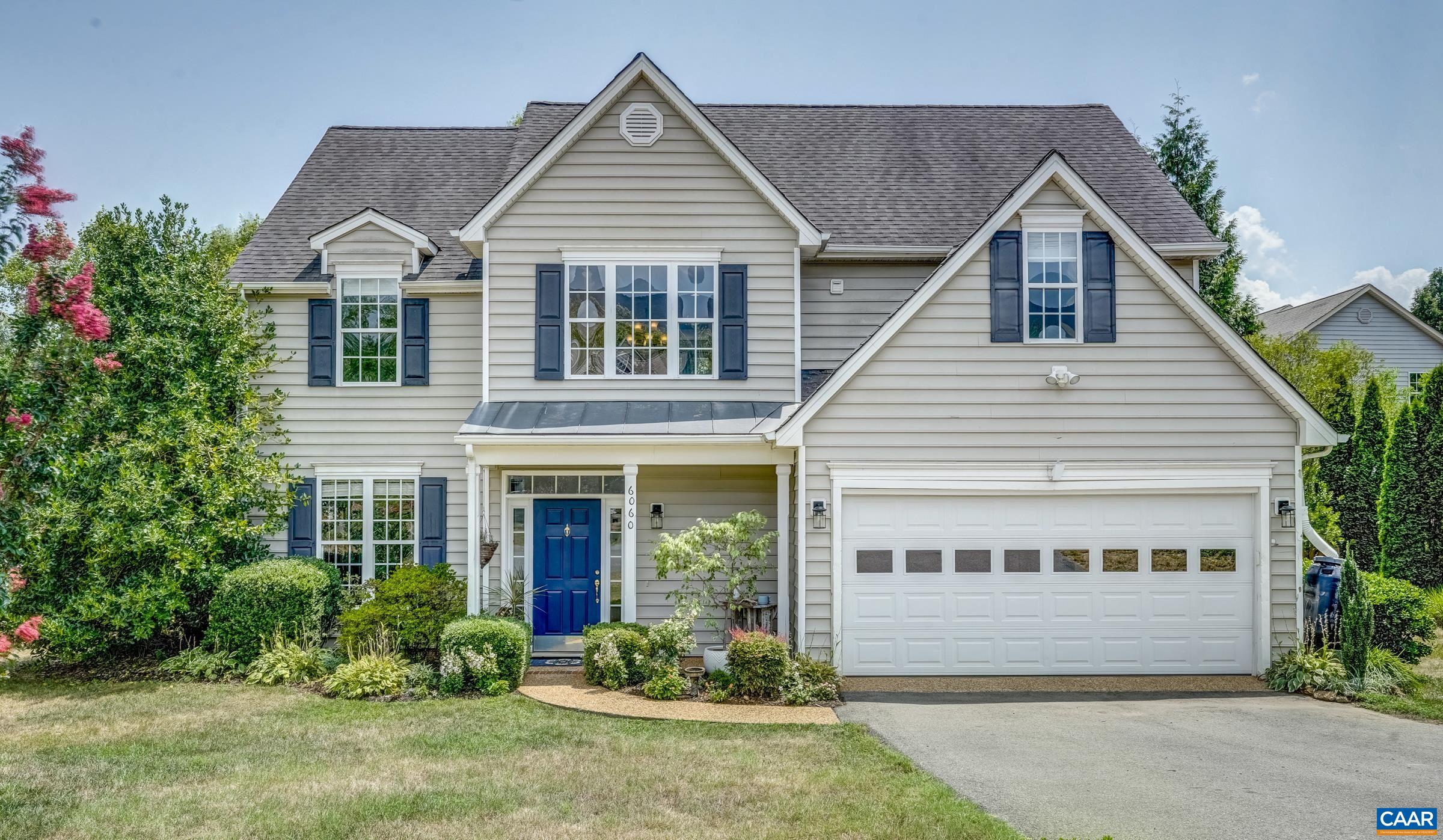 Exceptional one-owner home on a cul de sac in desirable Grayrock! A charming front porch welcomes visitors to this brightly lit home w/ a designer's flair in one of the builder’s most popular models. Hardwoods & tile throughout main level! An open floor plan is highlighted by spacious great room, kitchen and dining nook all flowing into relaxing outdoor spaces, including private patio, gardens and level fenced yard. Whip up dinner in the gorgeous kitchen w/ gleaming granite, stainless appliances & painted cabinetry. A separate DR with handsome shadowbox molding and tray ceiling also overlooks the gardens. And there's plenty of room for a home office - Fiber Optic! The upper floor plan offers generously sized bedrooms, convenient laundry and access to attic storage. An airy Owner's Suite is appointed w/ double tray ceiling, room for sitting area, 2 large WICs plus a renovated bath w/ jetted tub! Discover the perfect balance of privacy, convenience & a pitch-perfect location close to bustling Crozet, wineries, breweries and sought-after western Albemarle schools.