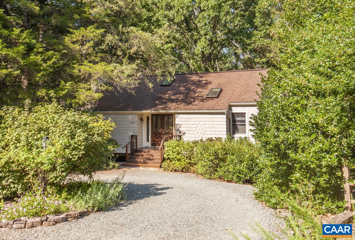Discover your dream home: Located in a coveted neighborhood of single-family homes, this charming residence offers the perfect blend of rural tranquility, urban convenience and character of rural living. Tucked away in a private setting, this home is a true retreat. Enjoy a floor plan with wood floors and an abundance of built-in bookcases. Cook in style with updated maple cabinets, solid surface countertops, lots of cabinets and a layout for everyday living and entertaining. Enjoy two fireplaces-one wood-burning and another w/stone surround and Neo woodstove in the winter. Benefit from low-e windows and 50-year roof. Last but not least enjoy your Outdoor Oasis. Relax in your personal paradise with an inviting outdoor spa and a picturesque gazebo in your private setting. 15 minutes from the city.