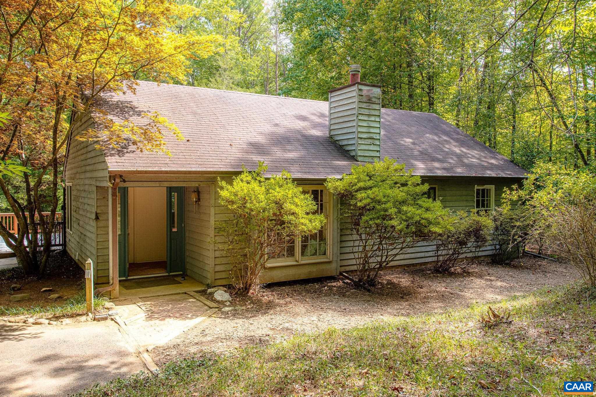 OPEN HOUSE Sat 8/10 12-2PM, Sunday 8/11 5-7PM. THREE BEDROOM POTENTIAL Main level living in this charming one level home on nearly an acre and a half in Earlysville! You will love the coziness of the living room with a wood burning fireplace and large windows looking into the front yard. The family room boasts vaulted ceilings and plenty of natural light coming through the plentiful windows and skylights. The open flow concept makes getting around this home easy, and the rooms are spacious. Put the portion of the wall back up and create the third bedroom, or keep this space open for a large living area! Much of the home is freshly painted with new flooring, and HVAC was replaced in 2021. New Water Heater. The cleared backyard is fenced in for your pets. Relax on the large side deck, while enjoying the privacy of this partially wooded lot. Connects to trail system behind home.Convenient to 29N, and just a short drive to the City of Charlottesville. Schedule your showing today!