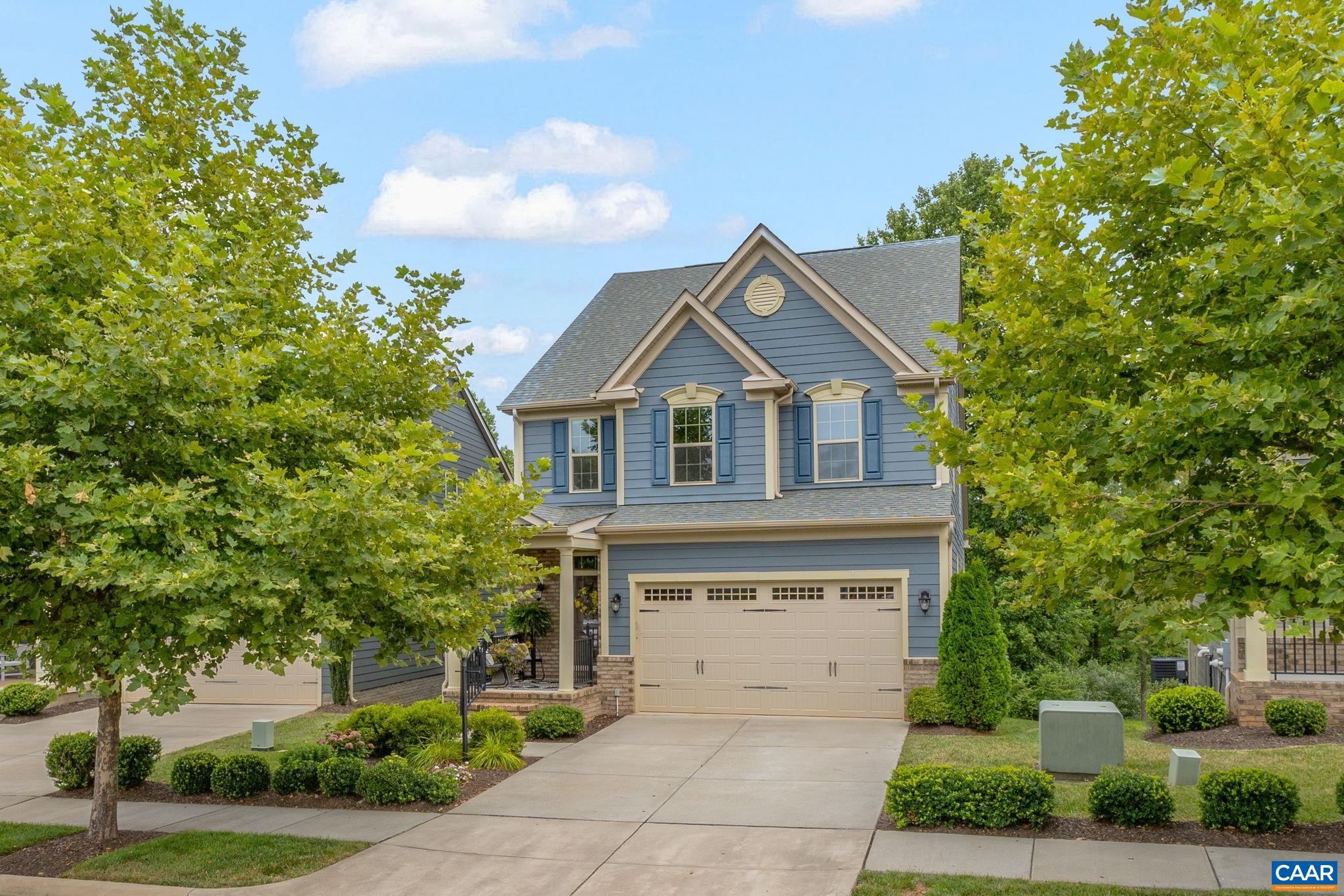 Nestled against a natural wooded backdrop & offering a bold westward view of the Blue Ridge Mountains from its backyard, this home has been adored by its original owners. Located in the vibrant Cascadia neighborhood, enjoy a wealth of amenities... 2 playgrounds, pool, clubhouse, community garden plots & walking trails. HOA covers full-service exterior landscaping, making lawn care a breeze. Main living area is thoughtfully designed for convenience & style, featuring a spacious foyer that leads to an open-concept layout. Gourmet kitchen boasts lots of counter & cabinet space, a breakfast bar & pantry. Utility/laundry rm & a powder rm are conveniently situated between the kitchen & 2-car garage. Adjacent to the kitchen, a cozy great rm features vaulted ceiling & gas-log fireplace. Primary bedrm, located on the main level, includes an en-suite bath & a walk-in closet. Upstairs, a generously sized loft overlooks the great rm & is flanked by 3 large bedrms (1 used as an office) & a full bathrm. Spacious terrace level offers a versatile open space, full bath, & a mechanical rm/workshop. Outdoor living space is a show stopper! You'll fall in love with the rear deck & patio below, both showcasing a captivating westward mtn. view.