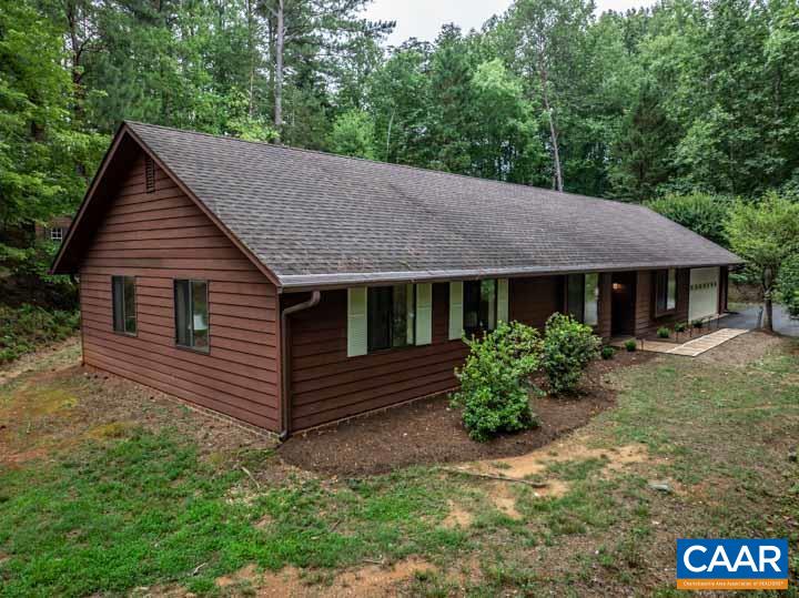 Back on the market through no fault of the seller. Discover 4365 Beaver Creek Rd, a secluded 2.4-acre corner lot surrounded by forests and open greenspaces. Attached two-car GARAGE, LeafGuard gutters, and spacious PAVED driveway with a large turn-around. With a lighted patio at one side of the property and a cleared, level lawn area at the other, it's perfect for outdoor living. Inside, enjoy new Greenguard Gold-certified LVP flooring throughout the home. Open concept design centers on beautiful, well-appointed kitchen with custom alder-wood cabinets, Bosch induction cooktop and convection oven, QUARTZ countertops, and a farmhouse sink. The rustic family room offers built-in cabinetry and a wood stove. The large laundry room can double as a home office. Just minutes from the Hollymead shopping center and Charlottesville. The backyard garden shed conveys with the property. With only one adjacent neighbor and backing onto a horse-farm grazing area, this property offers serenity and exclusivity. Don't miss out on 4365 Beaver Creek Rd—a perfect blend of rural charm and modern comfort.