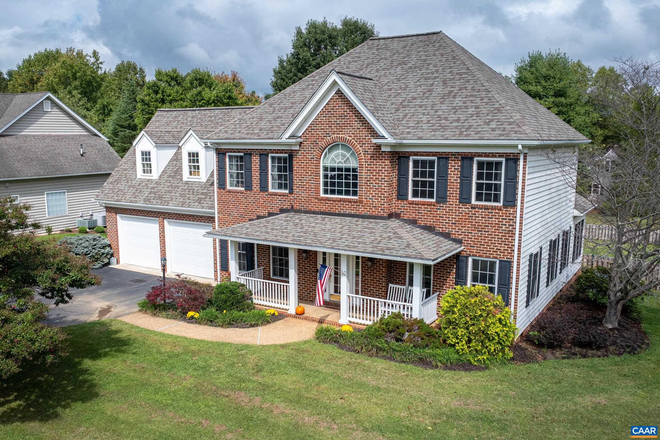 The unique features of this property in highly desirable Cory Farm are numerous: flat corner lot with fully fenced backyard, two-sided gas fireplace btw family room and light-drenched sunroom, gorgeous 768 SF Trex deck addition, full-length covered front porch, 600 SF garage, generous 4th BR over garage with ensuite bath and tons of storage. New roof 2019, HVAC 2019, Trex deck 2021, fence 2023, fridge 2024. Previously renovated kitchen includes granite counters, island with seating, newer appliances, maple cabinets, work station with desk and cabinets, and a well-lit, bump-out breakfast nook overlooking the huge deck and flat backyard. Primary suite includes tucked away office, walk-in closet, dual vanities and jetted tub. 2nd floor also offers 2 addt'l BRs off the hallway that share a full bath and a large and comfortable 4th BR over the garage with ensuite bath.  Common area behind fence creates additional privacy w/o maintenance. Walk to another large common area 5 minutes from your front door to enjoy fields with walking trails and a creek. Western schools. 20 min to UVA. 5K seller credit at closing for new carpet/flooring.