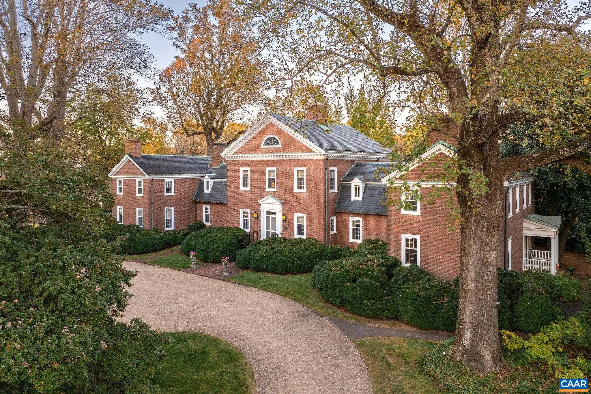 Nestled on 77 acres in the Virginia countryside, Mount Sharon offers an extraordinary blend of Georgian architecture, rich history, and exquisite gardens. Designed by renowned architect Louis Bancel LaFarge, the 10,000+ square-foot main house is complemented by 10 acres of meticulously crafted Italian, French, and English-style gardens, with breathtaking views of the Blue Ridge Mountains. The main house is designed for gracious living and entertaining, offering expansive spaces ideal for hosting guests, gatherings, and large celebrations.  The property also features multiple outbuildings, including a farm manager’s house and a guest house with an office on the main level—perfect for accommodating staff, guests, or business needs.  For equestrian enthusiasts, the estate includes a seven-stall stable with a tack room, along with 147 acres of adjoining land available for purchase at $1.25 million. The additional land features a classic 1930s Sears Belmont-style barn with 20 stalls, rolling pastures, a pond, 4 run-in sheds, and multiple paddocks. Together, these create a 224+ acre world-class equestrian estate.