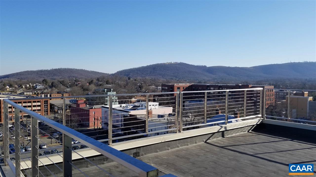 This extraordinary penthouse condo is the embodiment of city living in Charlottesville. The floor to ceiling windows have northern views over the Historic Downtown Mall as well as southern views of the Blue Ridge Mountains. With 3,602 square feet of customizable interior space, this “core and shell” unit leaves no limits but your imagination in design. The 1,230 square feet of exterior living offers picturesque scenery of the surrounding city and mountains, ideal for outdoor relaxation, dining, and entertaining. Suite 801 gives you the perfect opportunity to bring your designer and create your own downtown oasis.