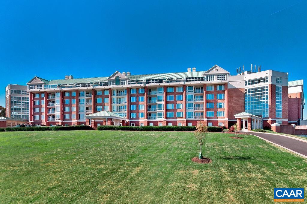 Freshly painted 4th floor University Village condo featuring 2 BR/2 BA+den. Located on the end, convenient to the elevators, this west facing home has Blue Ridge Mt views from every window. This elegant, low maintenance home has a dedicated garage parking spot and individual secure storage space. Lovely, private balcony. Condo fee covers: heating, cooling, electricity, water, sewer, trash, basic cable, all community amenities, including year-round heated indoor 75'pool, fitness rooms, library, art studio, LYFT services & more. Fine dining is available M-F at resident's option. Heating: gas fired hydronic forced air system central to the building/ an individual air handler in eachunit. Cooling comes from master chiller. This active 55+ community fosters engagement through interest groups, speakers, social events. Minutes from all that Charlottesville offers. Small pets allowed.