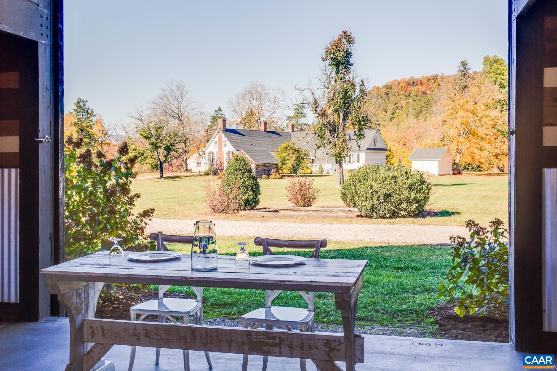 Discover Glen Haven Farm, a 49.03-acre estate established in 1832, set along the Cowpasture River, one of the cleanest rivers on the East Coast. Once home to the Jordan family, this historic property offers modern amenities, including a 4,824 sq ft farmhouse with 4 bedrooms, 3 baths, and a one-bedroom apartment. The property features a rustic, industrial-chic 3,500 sq ft event barn, a river pavilion, a performance stage, a 5,000 sq ft industrial workshop, a 1-acre commercial hop yard, and low-light conditions ideal for stargazing. Operating as a venue since 2017, Glen Haven hosts 20+ weddings and events annually, including fireworks shows. The property comes fully furnished, includes farm equipment, and a primitive campground with potential for expansion. Located within 3 hours of D.C. and 1.5 hours from Charlottesville, Glen Haven Farm blends historical charm, business success, and natural beauty, ready for its next chapter.