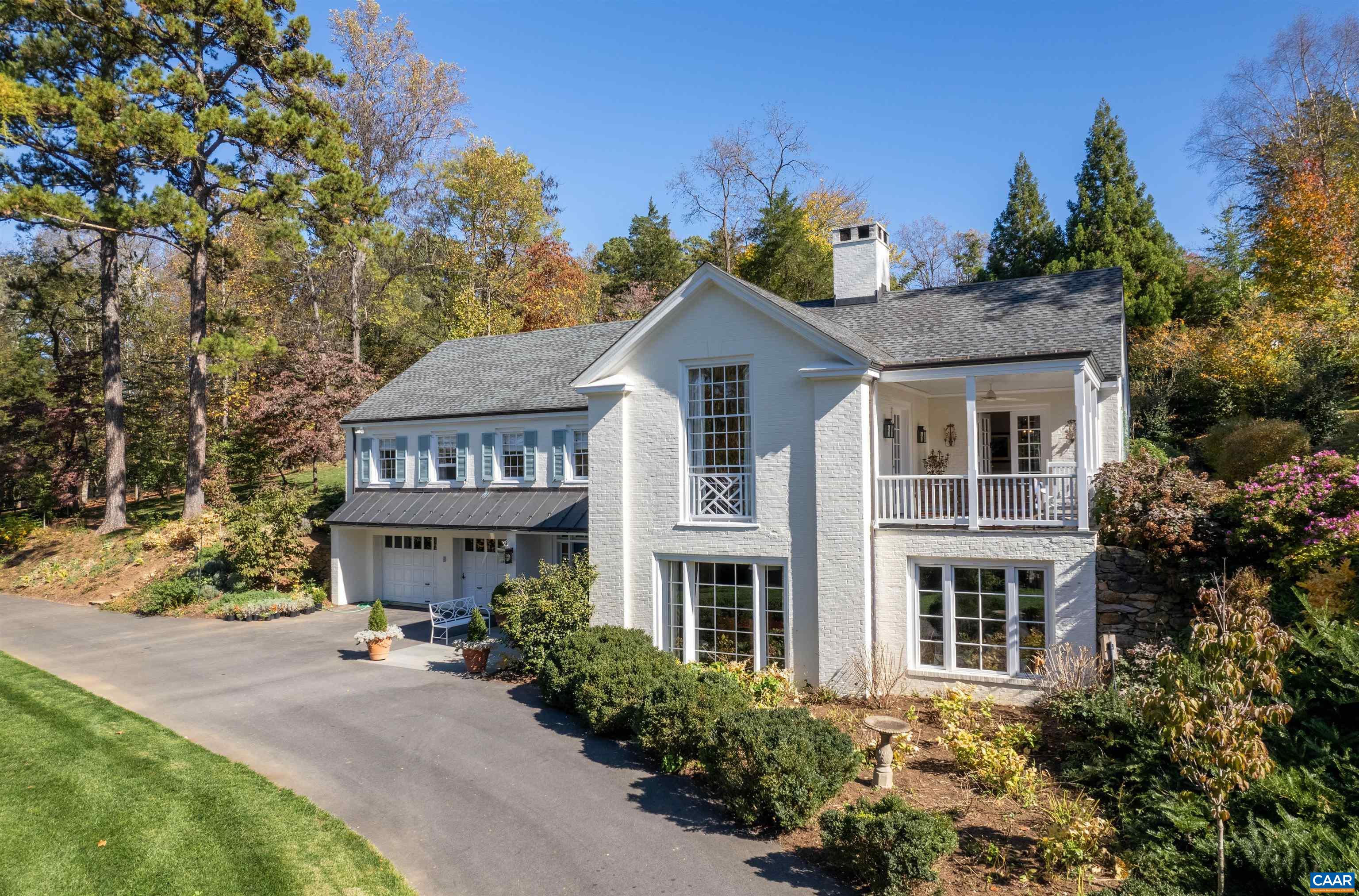 Beautifully renovated home in Bellair. Dining room opens directly onto a covered porch, perfect for seamless indoor-outdoor dining and entertaining. Living room captivates with a vaulted ceiling, custom floor-to-ceiling bookcases, and lots of natural light. The terrace level features a spacious rec/family room and a dedicated exercise room, ideal for fitness and relaxation. The property also includes a two-car garage, providing ample space for vehicles and storage. Outside, the owner has meticulously landscaped the grounds, planting 50 trees and over 1,000 perennials that flourish under an efficient irrigation system. Conveniently located near Boars Head, UVA and easy access to downtown.