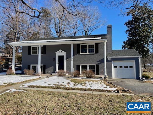 Unbeatable LOCATION in Albemarle within MINUTES to all the hot spots in Charlottesville. This home sits on an expansive corner lot, in established neighborhood with paved driveway and attached garage. NEWLY updated, this property is a cool combination of modern with a retro touch. The main living space features living room, eat-in kitchen, family room, dining and a half bath. Built in bookshelf and the gas fireplace are a stand out in the living room, while the family room offers a separate space for entertaining. NEW granite and tiled backsplash accent the kitchen along with a quaint breakfast bar space. The 2nd level houses a full bath, 2 generous sized bedrooms and a primary en-suite. Recently refinished hardwood flooring throughout the 2nd level GLEAM! The back yard has a great patio area as well as an extra partially fenced grassy area to enjoy. Walk to school! Enjoy the conveniences of city living without the city taxes.