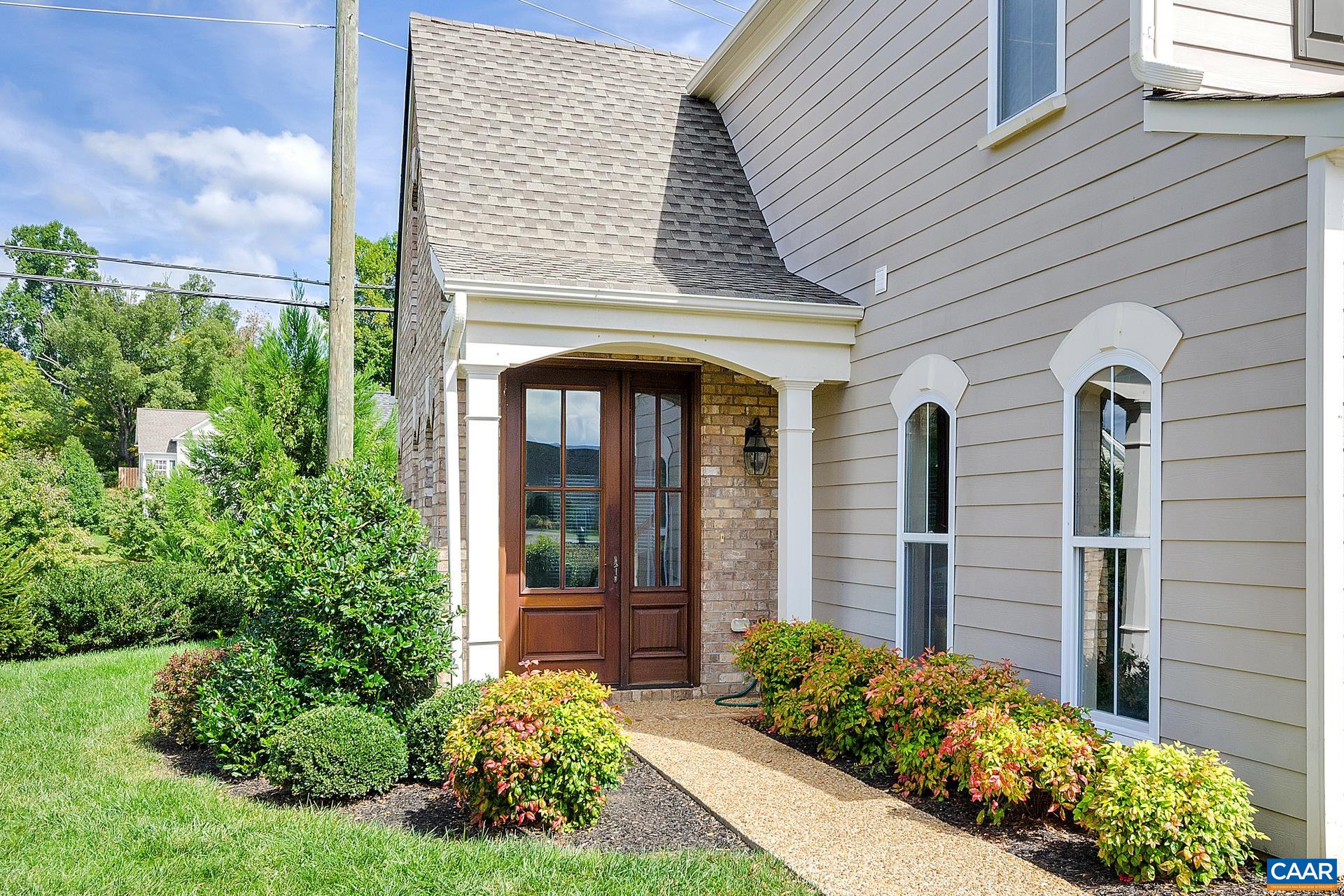 Nestled in The Village of Highlands in scenic Crozet, this like-new 3-bed, 2.5-bath villa offers 1,450 sq. ft. of stylish, low-maintenance living. Enjoy the feel of a private country neighborhood with mountain views, plus the convenience of town life.    This energy-efficient home boasts a brick & Hardie plank exterior, solid mahogany front door, and cathedral ceiling. The gourmet kitchen features granite countertops, maple cabinets, and stainless steel appliances. Hardwood & tile floors grace the main level, while a gas fireplace with a slate surround adds warmth.    Relax in the luxury master suite with a garden tub & separate shower Additional highlights include a washer & dryer, 2-car garage with an insulated door, private patio, and professional landscaping.    Located on a cul-de-sac in the Western Albemarle school district, this villa is the perfect blend of comfort, efficiency, and elegance. Schedule your showing today!
