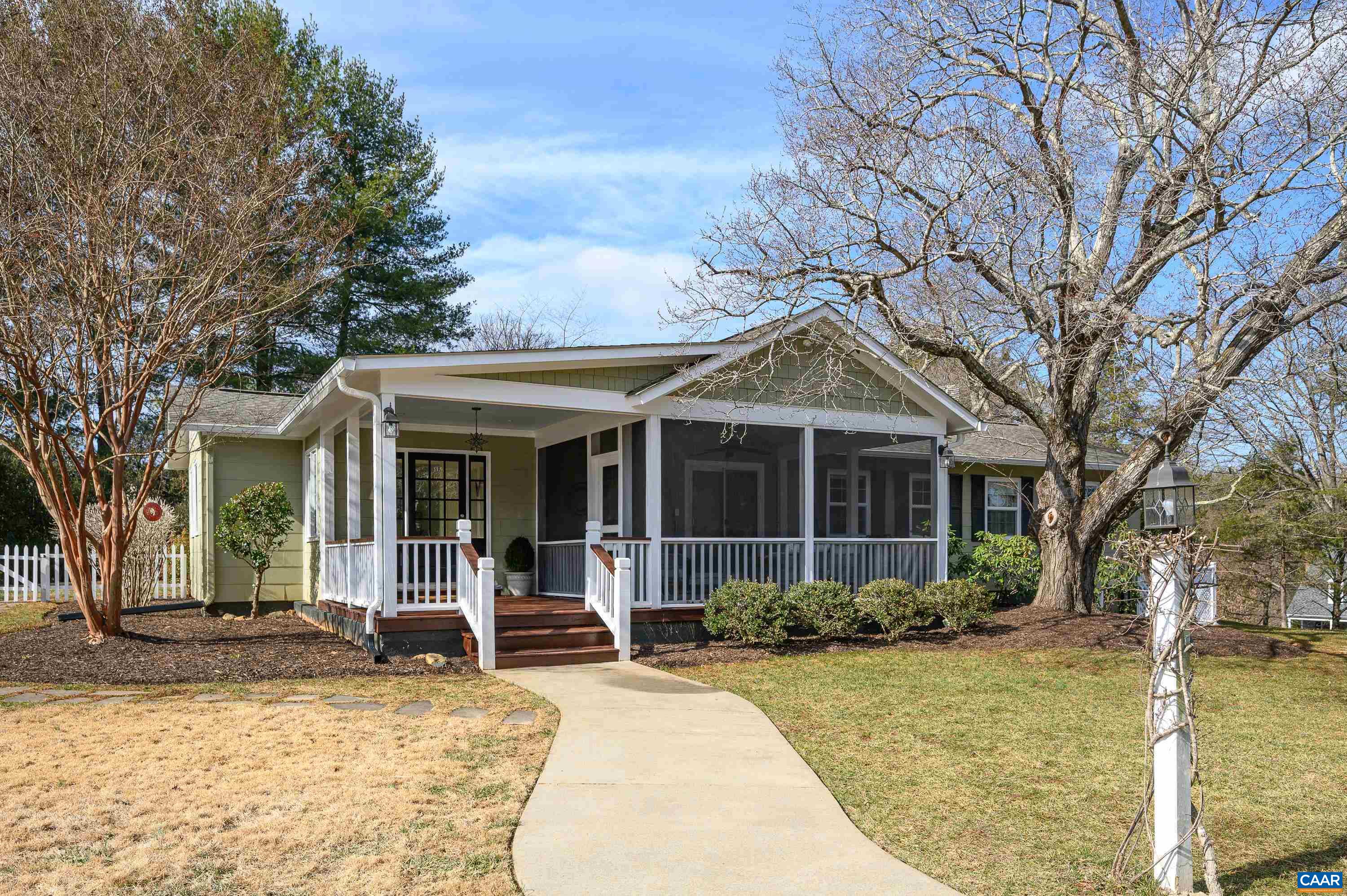Located in the heart of Ivy, this Mid-Century 3 Bedroom, 2 Bath, 1950's home has charming original details with tasteful additions making this a unique offering. The entry foyer opens to a bright living room with built-in cabinetry. A super floorplan for entertaining or casual living with the open kitchen and adjoining dining room. Indoor and outdoor living flow from the garden patio surrounded by 70-year-old boxwood and the relaxing screen porch. Primary Bedroom Suite with walk-in closet.  2 additional bedrooms and full bath complete the first floor. The lower level bonus room with large closet. There is a generous workshop, laundry area and plenty of storage space. Fresh paint & refinished hardwood floors make this home sparkle. A circular driveway with parking area is surrounded by a landscaped yard with a specimen magnolia and cherry tree giving a magical feel to the yard. Fenced garden area and utility shed are perfect for the gardener or storing bikes and kayaks. Explore Holkham's trails and the Blue Ridge Swim Club. Minutes to Ivy Elementary, Duners & Ivy P.O. Garbage Disposal '22, HVAC, Fridge & DW '23, Stove & water Heater'25. Owner is a licensed Real Estate Agent. Listing agent related to seller.