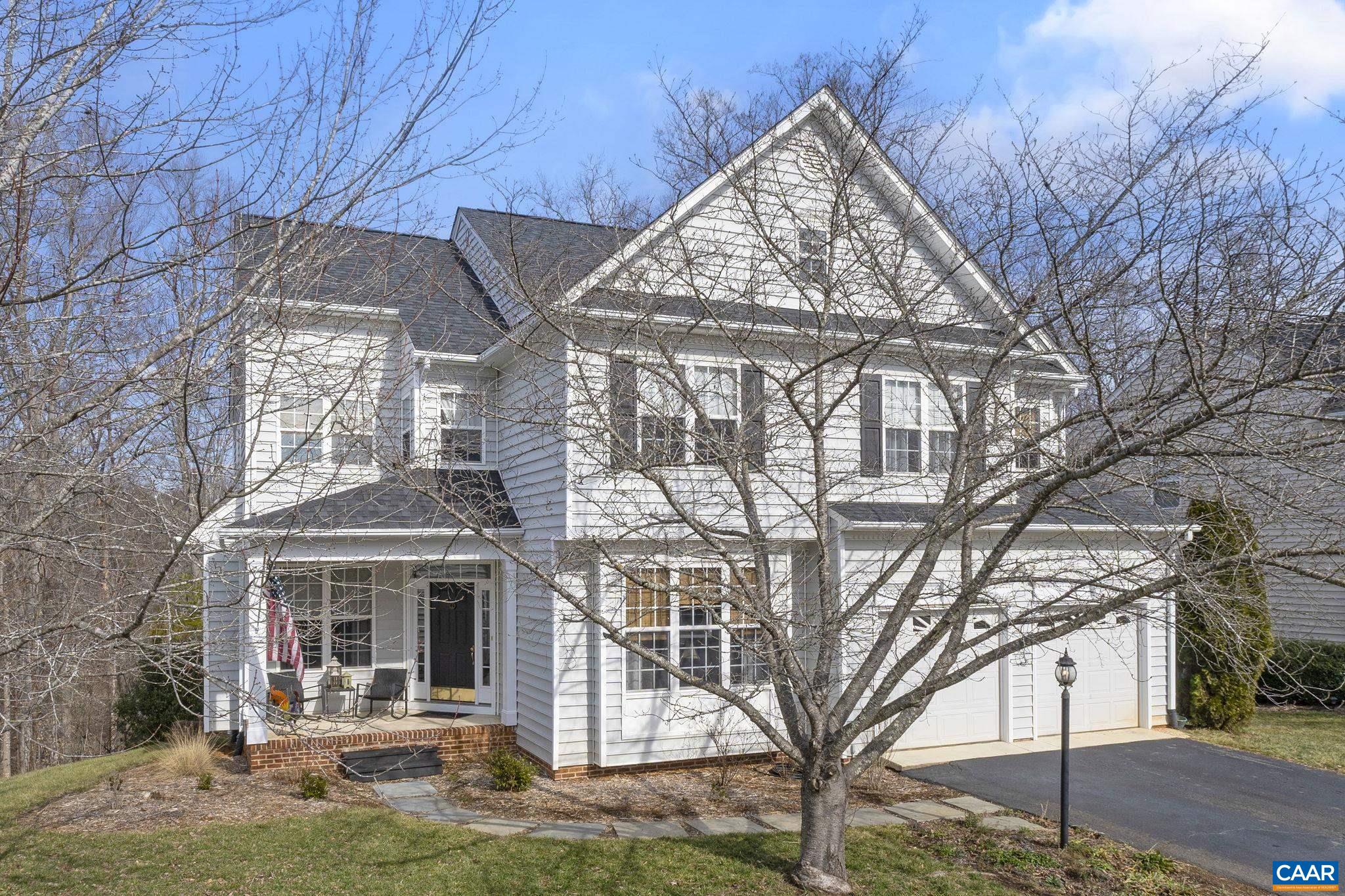 OPEN HOUSE 2/23 1 - 3 PM.  Welcome to this spacious and beautifully maintained 5-bedroom, 3.5 bath home in Western Ridge, Crozet! From the double-height foyer, one is presented with the formal & informal spaces, gourmet kitchen designed for the culinary enthusiast boasting a spacious island, top-of-the-line stainless steel appliances, custom cabinetry & ample storage space, making meal preparation a delight. Breakfast nook opens to the rear deck and is adjacent to the family room with gas FP. Down the hall is the powder room and laundry room leading to the 2-car garage. Second floor contains the spacious primary suite with sitting area, large walk-in closet and luxurious bathroom with dual vanities, soaking tub and walk-in shower; also 4 additional bedrooms and full bath. Renovated basement has versatile finished space that can serve as family room, home office, or entertainment area, plus full bath, utility room and plenty of unfinished storage space. Rear deck overlooks the gently sloping back yard w/fire pit area, perfect for outdoor living/entertaining, and woods. Swim & Tennis Club w/Fitness Center and Clubhouse are just down the road; Sentara Family Medicine/Orthopedics West and Bright Beginnings daycare located close by