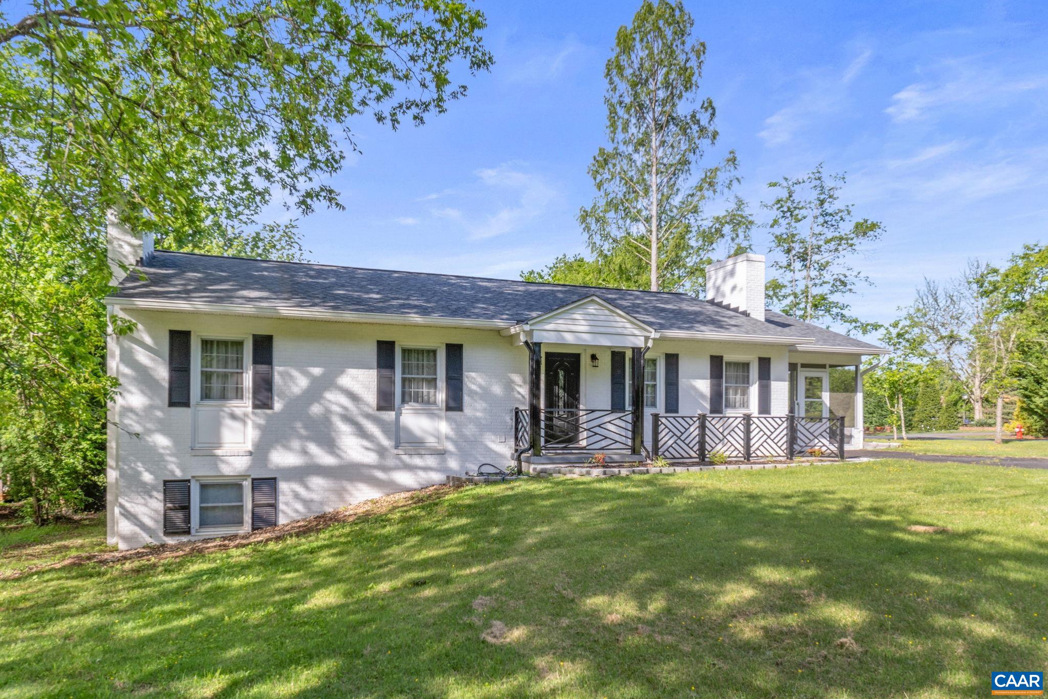 CHARMING, RENOVATED ONE-LEVEL HOME WITH STYLISH FINISHES & BASEMENT REC ROOM. Discover this beautifully renovated one-level home, ready for you to move in with fresh paint throughout, new LVP flooring, and a new roof (2022) & attic insulation. The contemporary kitchen has BEAUTIFUL QUARTZ COUNTERTOPS, STAINLESS STEEL APPLIANCES, a unique tile design & stainless steel sink. The bathrooms are equally impressive, boasting designer finishes & high-quality materials. You can enjoy the ease of one-level living with the added bonus of a PARTIALLY FINISHED WALK-OUT BASEMENT, perfect for a recreation room, home office, or guest space. A full bath and generous storage area make the lower level both functional and versatile. The LARGE SCREEN PORCH offers fresh air & nature with the grassy backyard just beyond. LESS THAN 5 MINUTES FROM CHO AIRPORT & Hollymead Town Center and just over that to NGIC & Chris Greene Lake Park.
