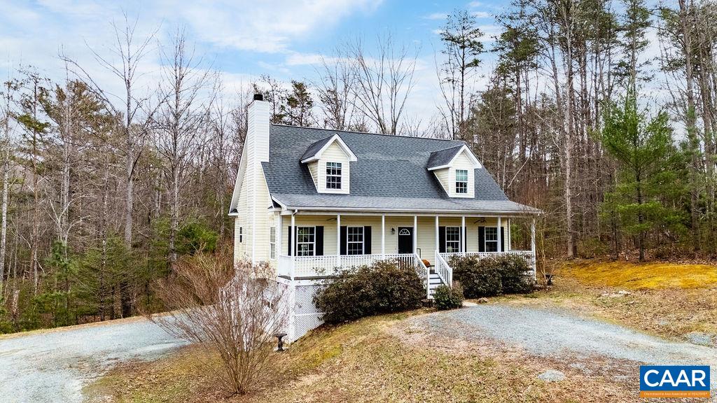Nestled in the heart of Free Union, this charming 3-bedroom, 2.5-bathroom home sits on over 8 acres of picturesque land, offering the perfect blend of country living and modern convenience. Just 25 minutes from downtown Crozet and less than 30 minutes to UVA, this property provides easy access to amenities while maintaining a peaceful, rural setting. The land is thoughtfully divided, with half in open pasture, ideal for farm animals and gardening, complete with fencing and a run-in shed, while the other half features mature hardwoods, providing privacy and natural beauty.  The home itself boasts ample deck and porch space, perfect for relaxing and taking in the serene surroundings. A full basement offers exciting potential for expansion, while the 2-car garage provides plenty of storage and workspace. Whether you’re looking for a mini-farm, a private retreat, or a family home with room to grow, this unique property is a rare find in Free Union.