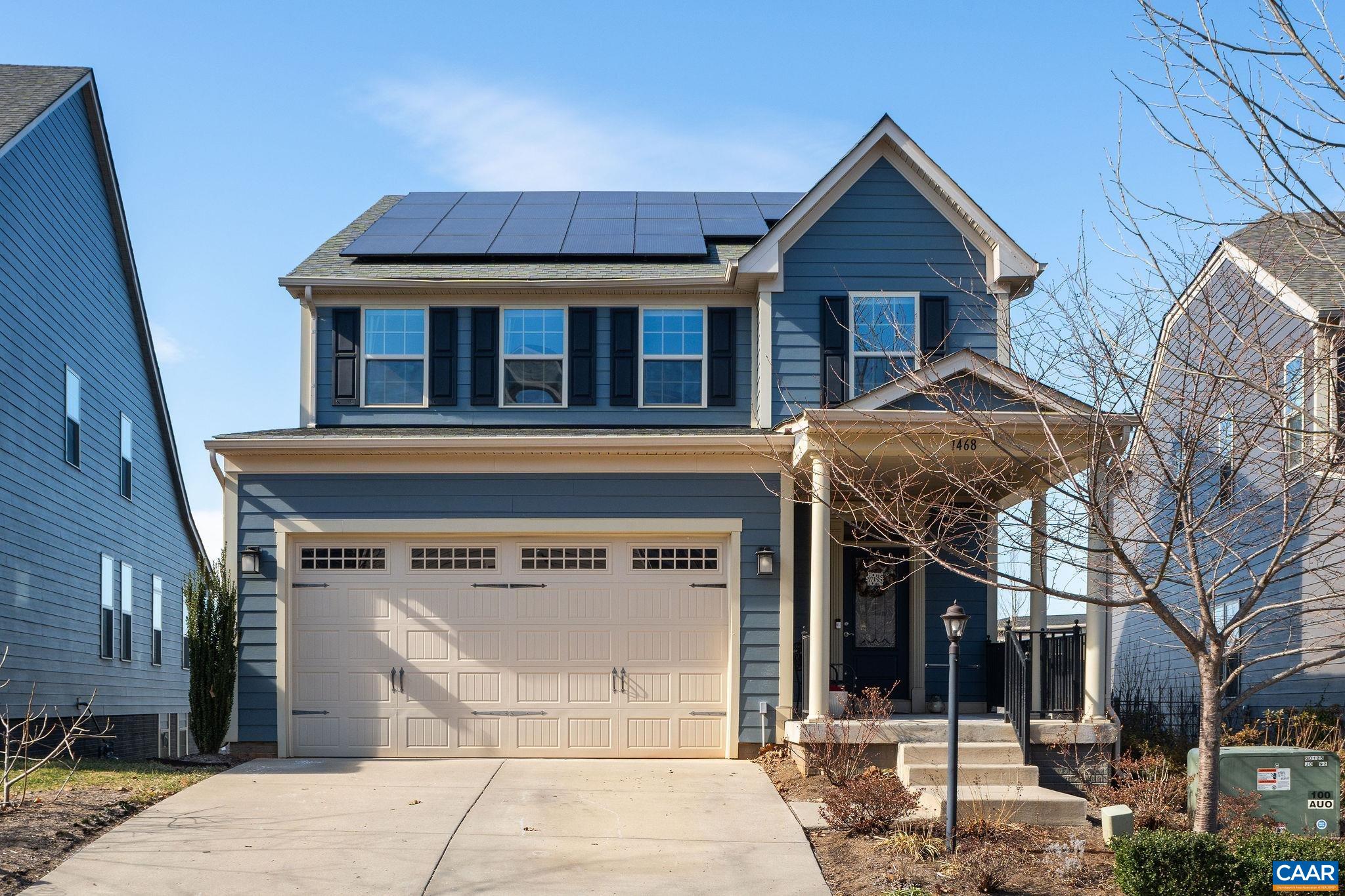 A stunning 4 bed, 3.5 bath home with incredible Blue Ridge Mountain views and Eco-Friendly features! Enjoy solar panels that keep your electric bill around $7/month, an EV charging station in the garage, and other efficiency upgrades like a tankless hot water heater, and enhanced air sealing. The heart of the home is the chef's kitchen, complete with stainless steel appliances, abundant granite countertops, a spacious pantry, and plenty of cabinet space. Recessed lighting highlights the elegance of the space, while beautiful hardwood floors flow throughout the main living areas, enhancing the home’s natural light. Two private office spaces offer the perfect remote work option. Four bedrooms, three full baths and a second floor laundry offer space and convenience. The walkout basement has multiple flex spaces for a work out room, rec room, and a separate office space. Exit the basement to a charming stone patio with a fire pit and garden area.  Located just minutes from Darden Towe Park, the Rivanna River, scenic walking/biking trails, and the Historic Downtown Mall, this home is perfect for those seeking both tranquility and easy access to local amenities. Gold Pearl Certified!