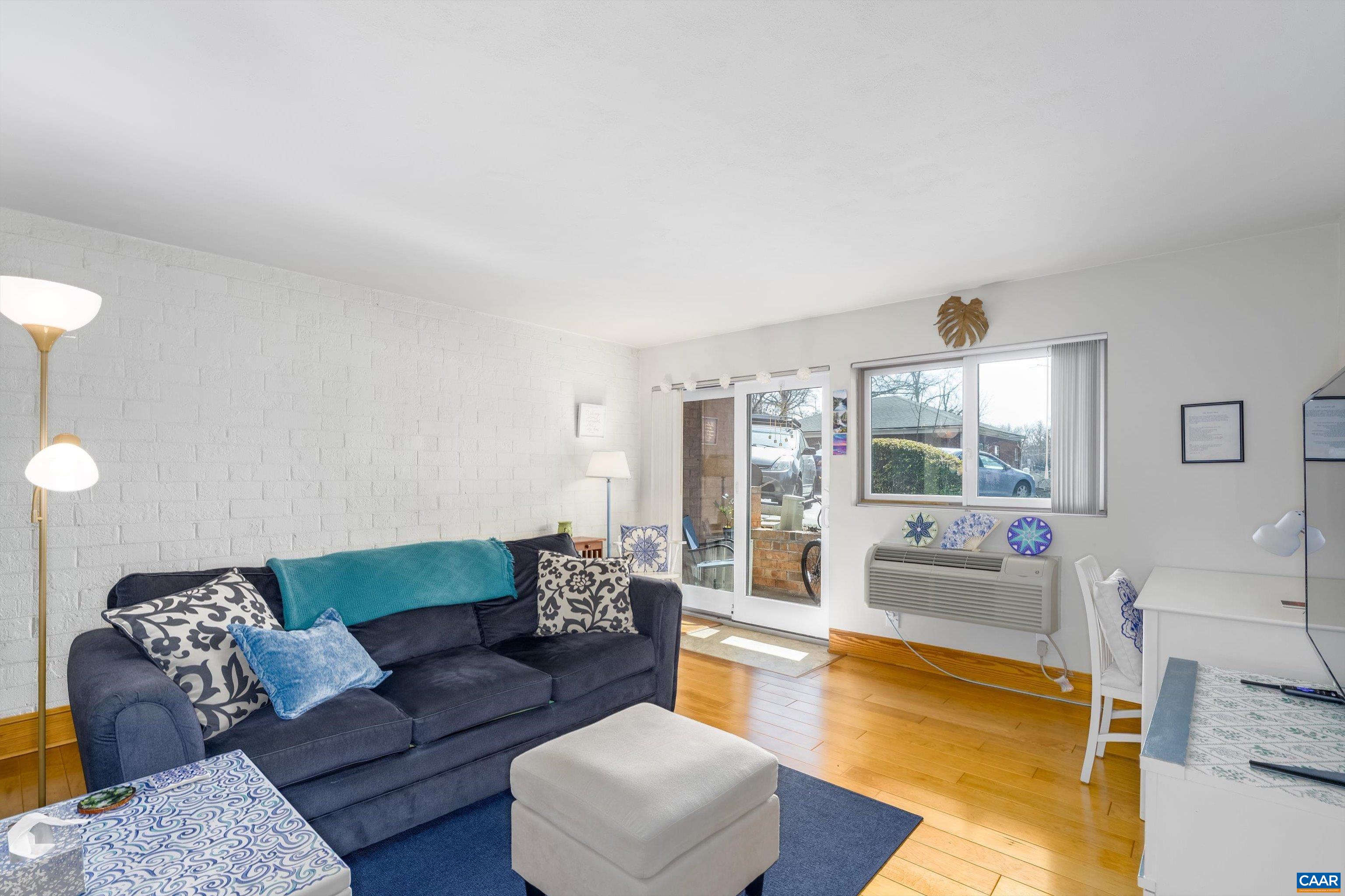 This unit hits ALL the marks: clean, updated, comfortable 1 BR, 1 Bath, garden-level condo includes hardwood flooring in the living room, carpeted bedroom, and in-unit washer/dryer. Redesigned cabinets offer great storage. Within WALKING DISTANCE of UVA Hospital and grounds (also on bus line) to give you access to endless shopping, restaurants, and cultural amenities, while offering comforting shelter so that you can rest, replenish, and return to conquer the world.