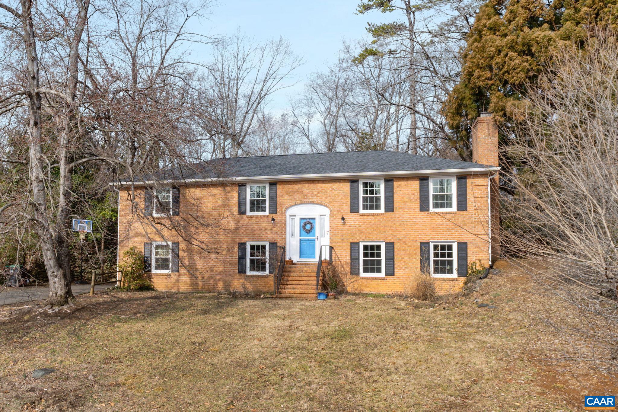 **Stunning 5-Bedroom, 3-Bath Brick Home in a Private Cul-de-Sac** Discover this impressive two-level brick home featuring 5 spacious bedrooms and 3 modern baths. The open-concept design includes a bright kitchen, dining room, and living room, complete with a convenient kitchen bar that leads to a private backyard and patio—perfect for entertaining! The lower level boasts a cozy family room with a charming stone fireplace, a wet bar/hobby area, and a utility and laundry space. Enjoy off-street parking and easy access to all that Charlottesville has to offer.
