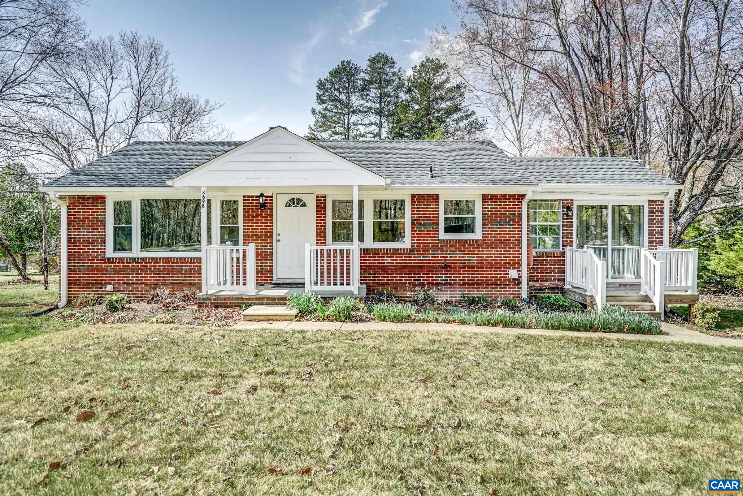 What an amazing VALUE for the money!!!  Move in ready!  Just bring your furniture!  Looking for a little land and a great yard? And a total renovation? Fabulous brick rancher just minutes to shopping, restaurants, UVA and all that Charlottesville has to offer. Ready for its new owners with so many improvements.  New roof in 2024. New LVP flooring, new paint, updated kitchen and bathrooms all make this home a must-see! New kitchen features granite counters, white cabinets, tile backsplash and all new stainless steel appliances.  Entertain in the large dining room and great room with picture window.  Two large bedrooms and renovated full bathrooms on the main level too! Lovely sunroom with inlaid tile flooring and sliding barn door is cozy year-round. Full basement with separate entrance could be an apartment/in-law suite. Featuring a bedroom, full bath with shower, large rec room, office/workout space and kitchenette with fridge, this extra space offers so many flexible options! Easy access to Route 29, Rivanna Station, Hollymead, and CHO!